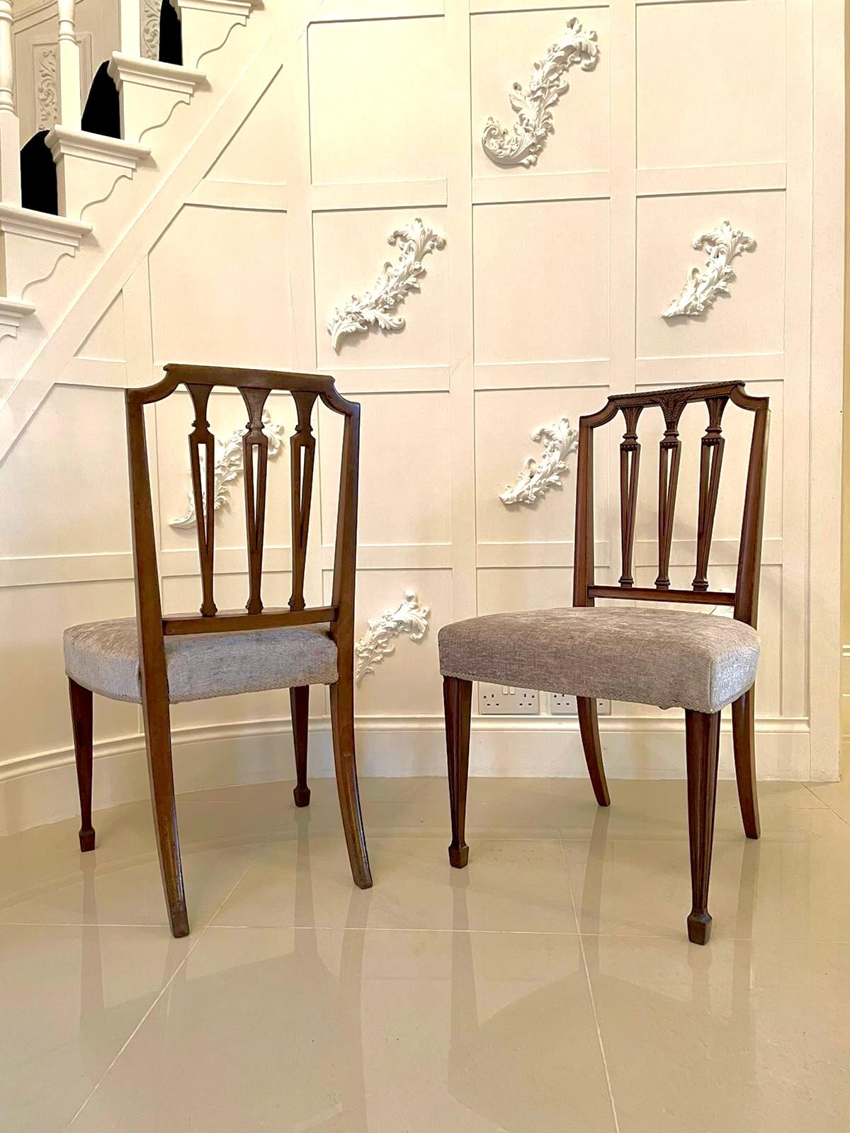Antique set of eight quality Victorian carved mahogany dining chairs having an attractive unusual shaped top rail and three quality carved reeded splats to the centre. The stand on elegant square reeded tapering legs with spade feet to the front and
