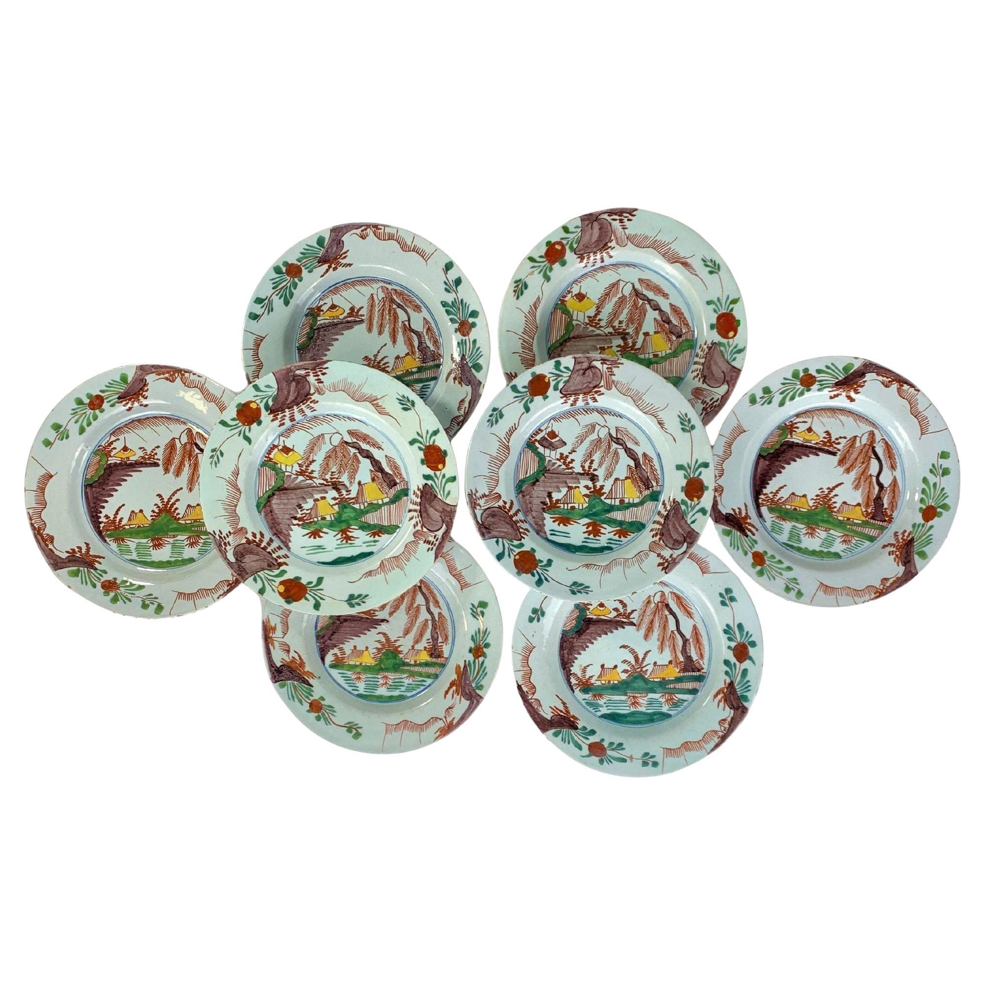 Juego de Ocho Platos Antiguos de Delft Holandés Pintados a Mano Escena de Paisaje Circa 1780 en venta