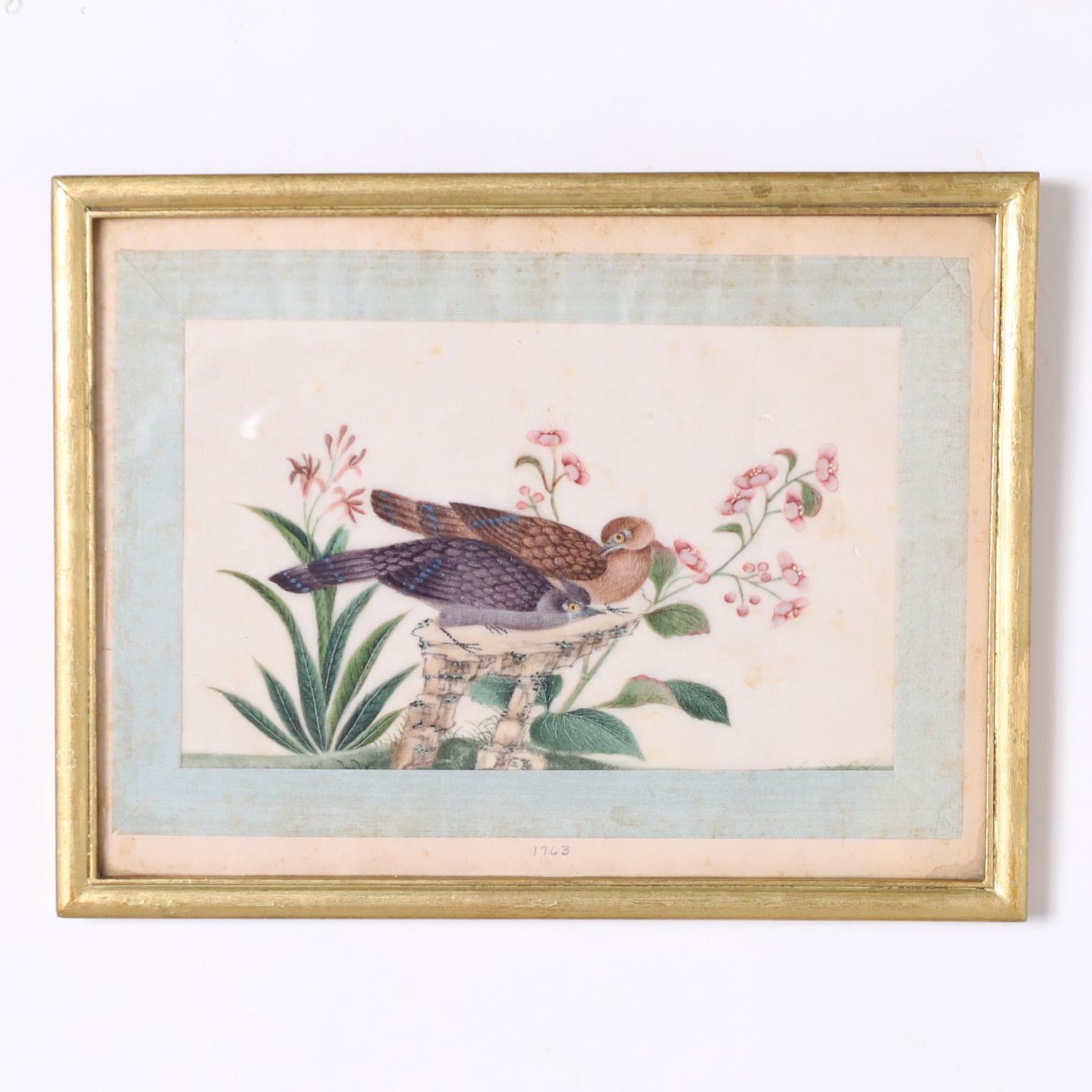 Rare and remarkable set of eight 18th century paintings of birds on silk executed with egg tempera in a delicate yet colorful style. Interesting historical footnote on the back of one. Presented under glass in a gilt wood frame.