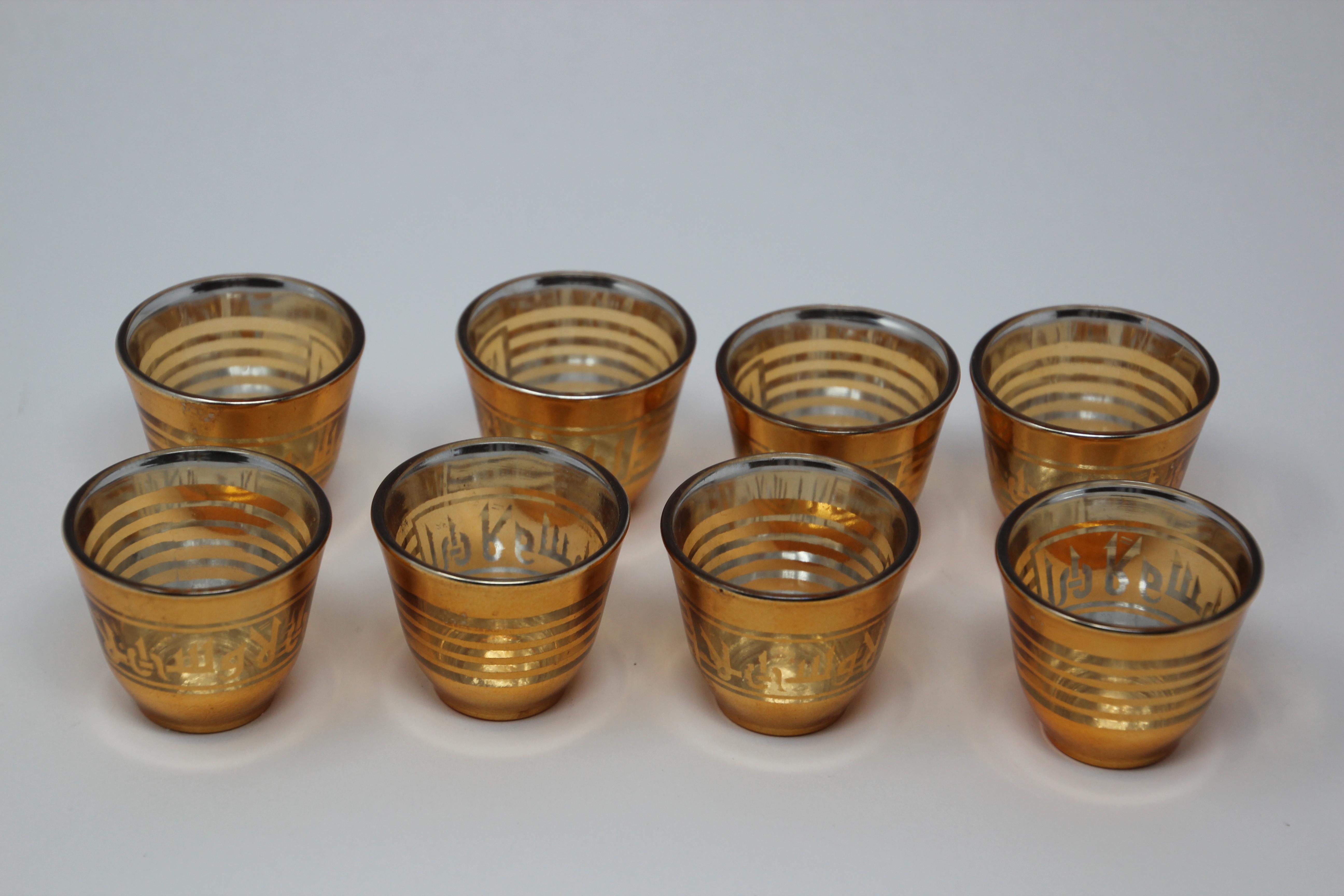 Set of six Arabic shot glasses with gold raised overlay design.
Use these elegant glasses for Moroccan, Middle Eastern, Persian tea, or any hot or cold shot liquor drink.
In fantastic condition, perfect for the holidays and gorgeous on display in a