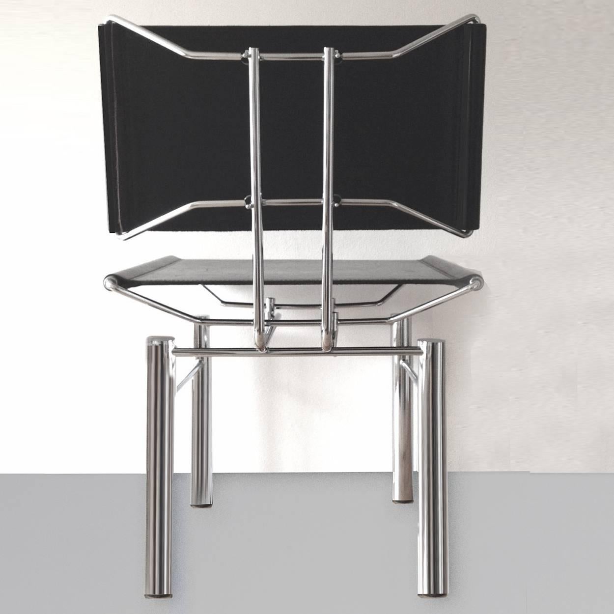 Set fabulous set of eight Hans Ulrich Bitsch series 8600 woven steel and chrome dining chairs for Kusch and Co. designed in 1982.It features a chrome frame with black upholstery. These iconic chairs are extremely architectural. 
In excellent