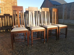 Set of Eight Arts & Crafts Glasgow School Oak Dining Chairs with Tulip Details