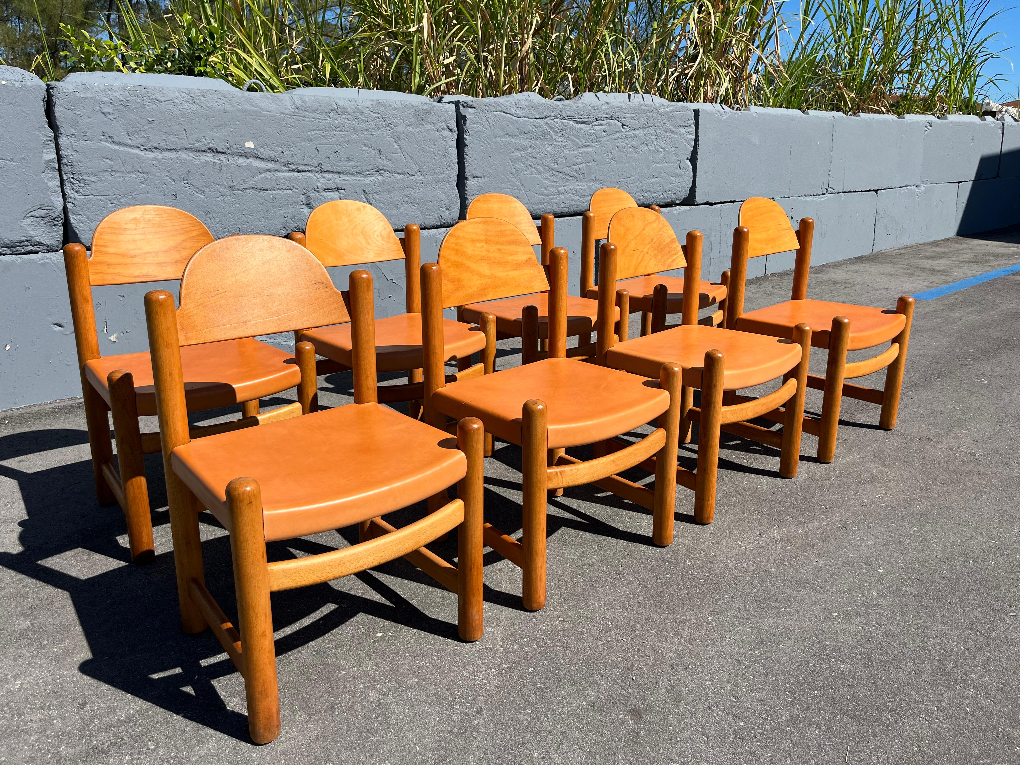 Set of Eight Birch and Leather Dining Chairs. Leather is very thick and has a beautiful patina. Each chair weighs about 20 pounds.