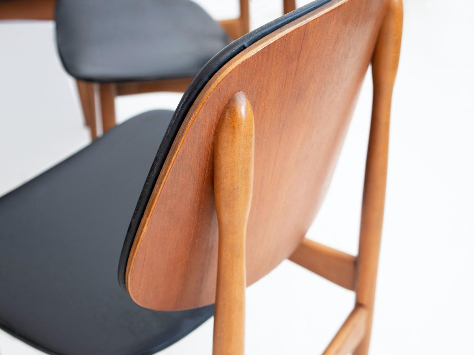 black leather and wood dining chairs