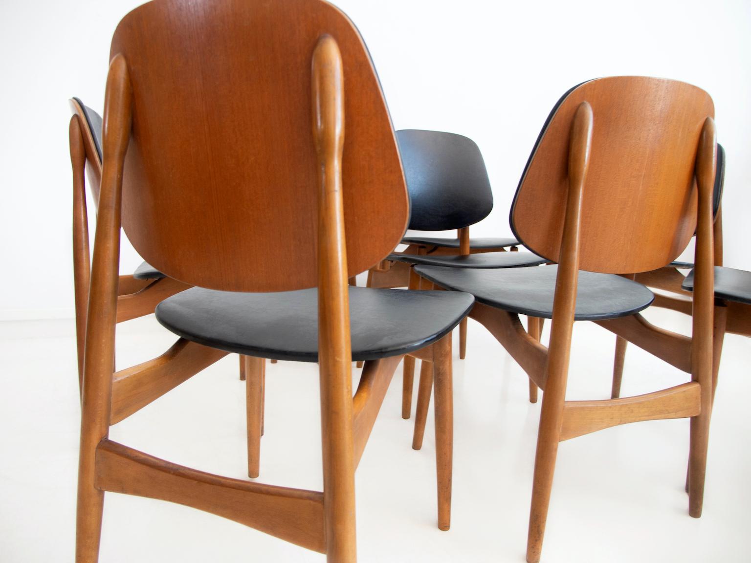 Set of Eight Black Faux Leather and Wood Dining Chairs In Good Condition In Madrid, ES