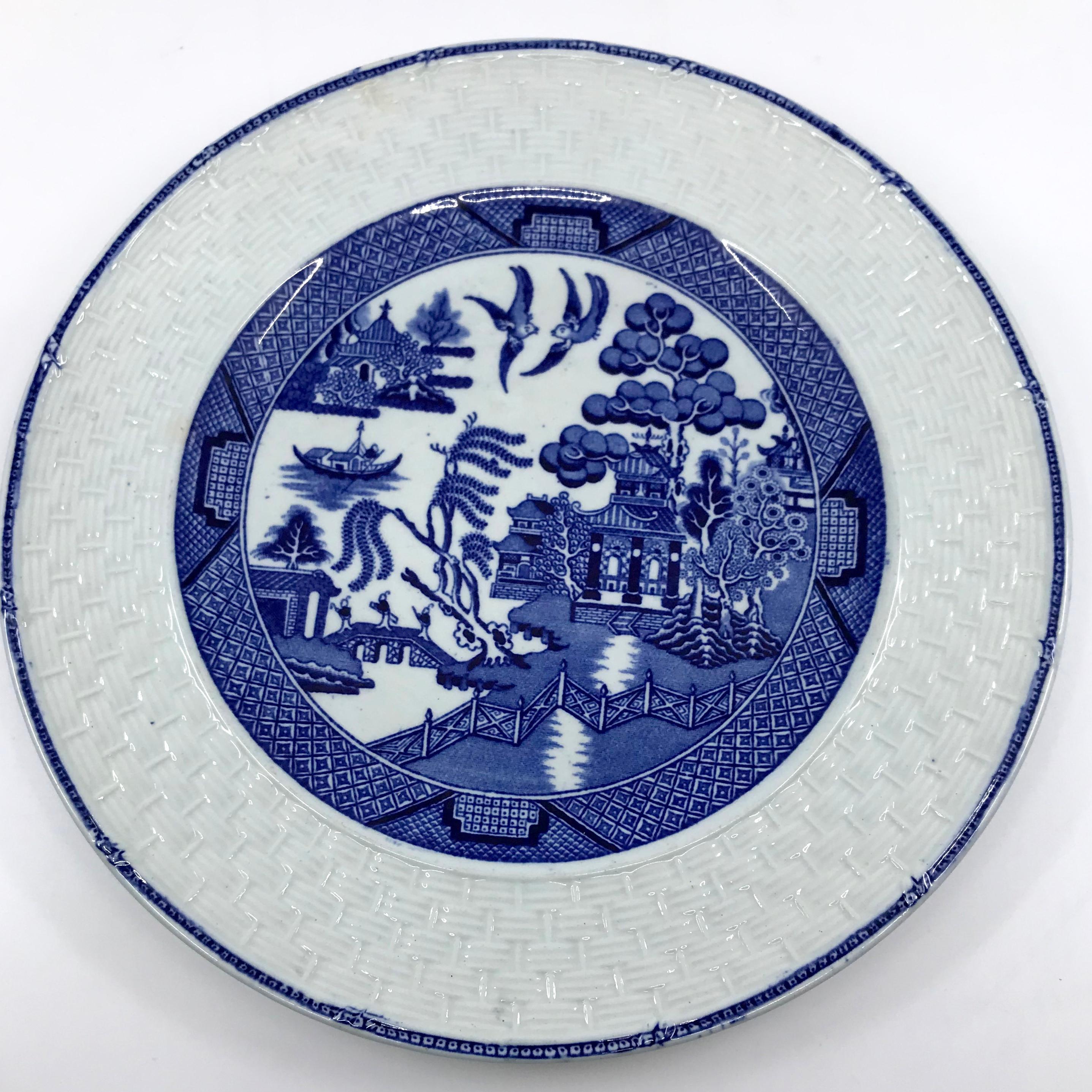 Pottery Set of Eight Blue and White Willow Basketweave Plates For Sale