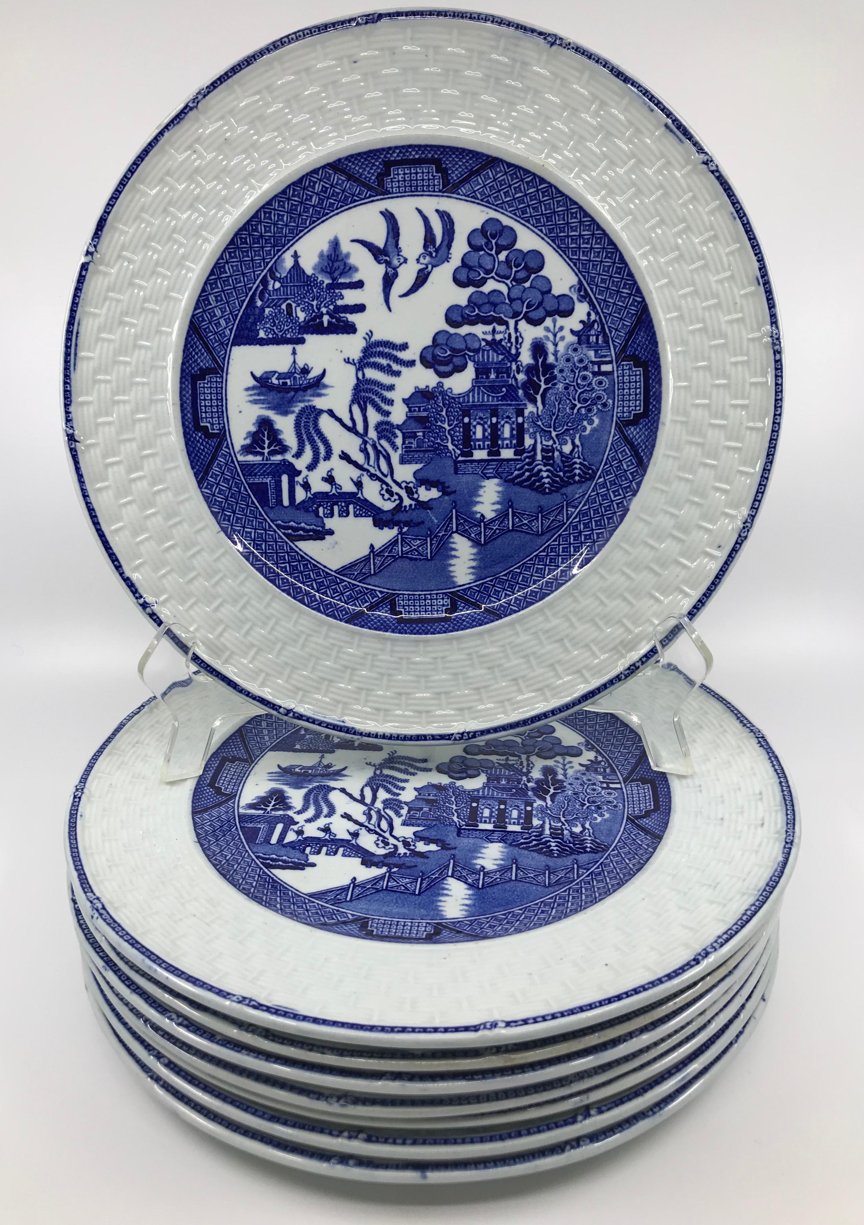 Set of eight blue and white willow basket weave plates. Blue and white willow plates with wide white banded basketweave border plates with outer blue rim with markings for Brown-Westhead, More & Co, Cauldon Potteries. Nov. 4, 1870. England