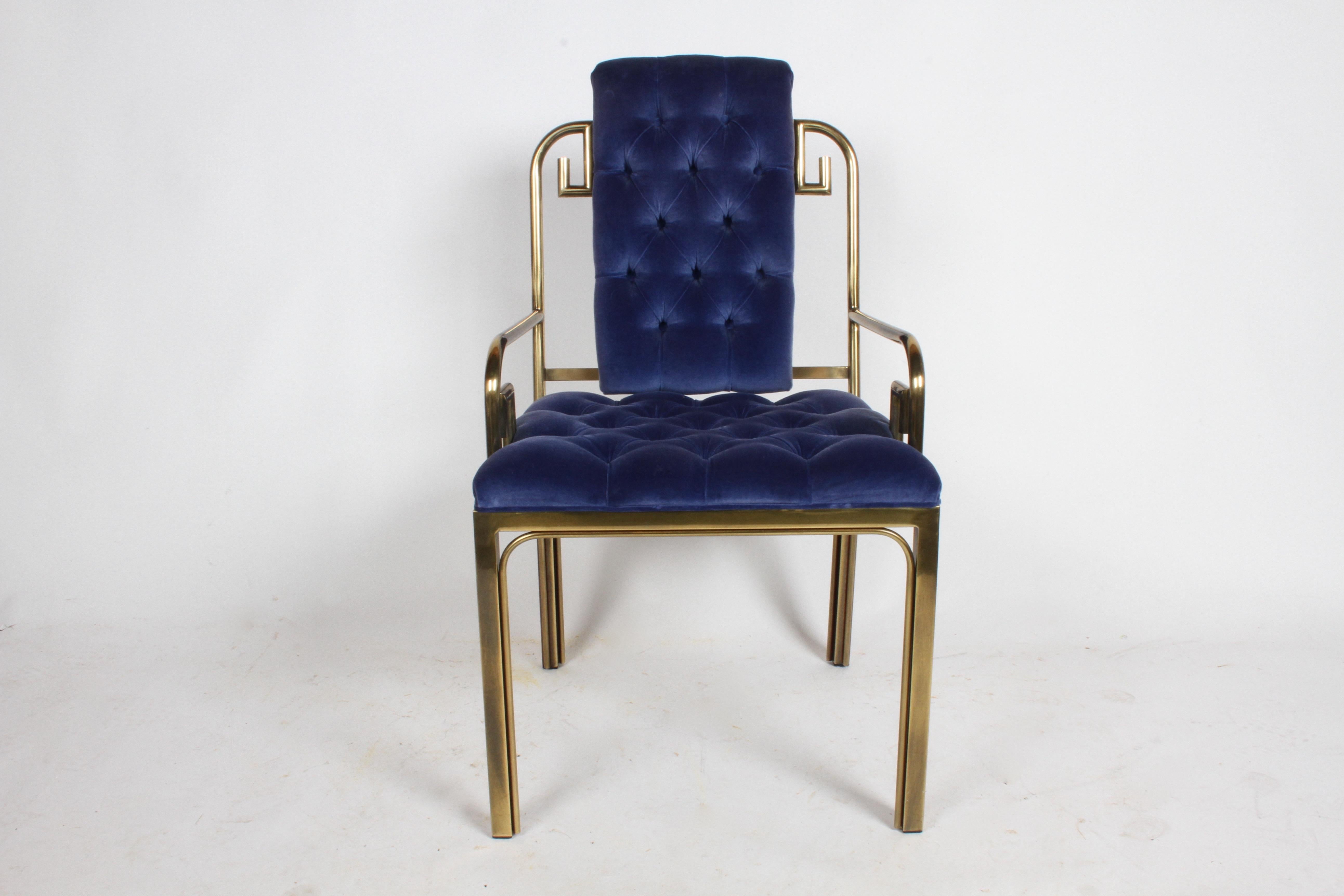 Beautiful matched set of eight brass frame Greek Key dining chairs by Mastercraft, circa 1970s. Shown with original blue velvet tufted seats, upholstery does have some stains. Should clean up okay, if professionally cleaned, if perfection is sought