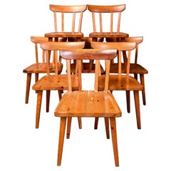 Set of eight Carl Malmsten dining chairs in solid Oregon pine, Sweden 1960s