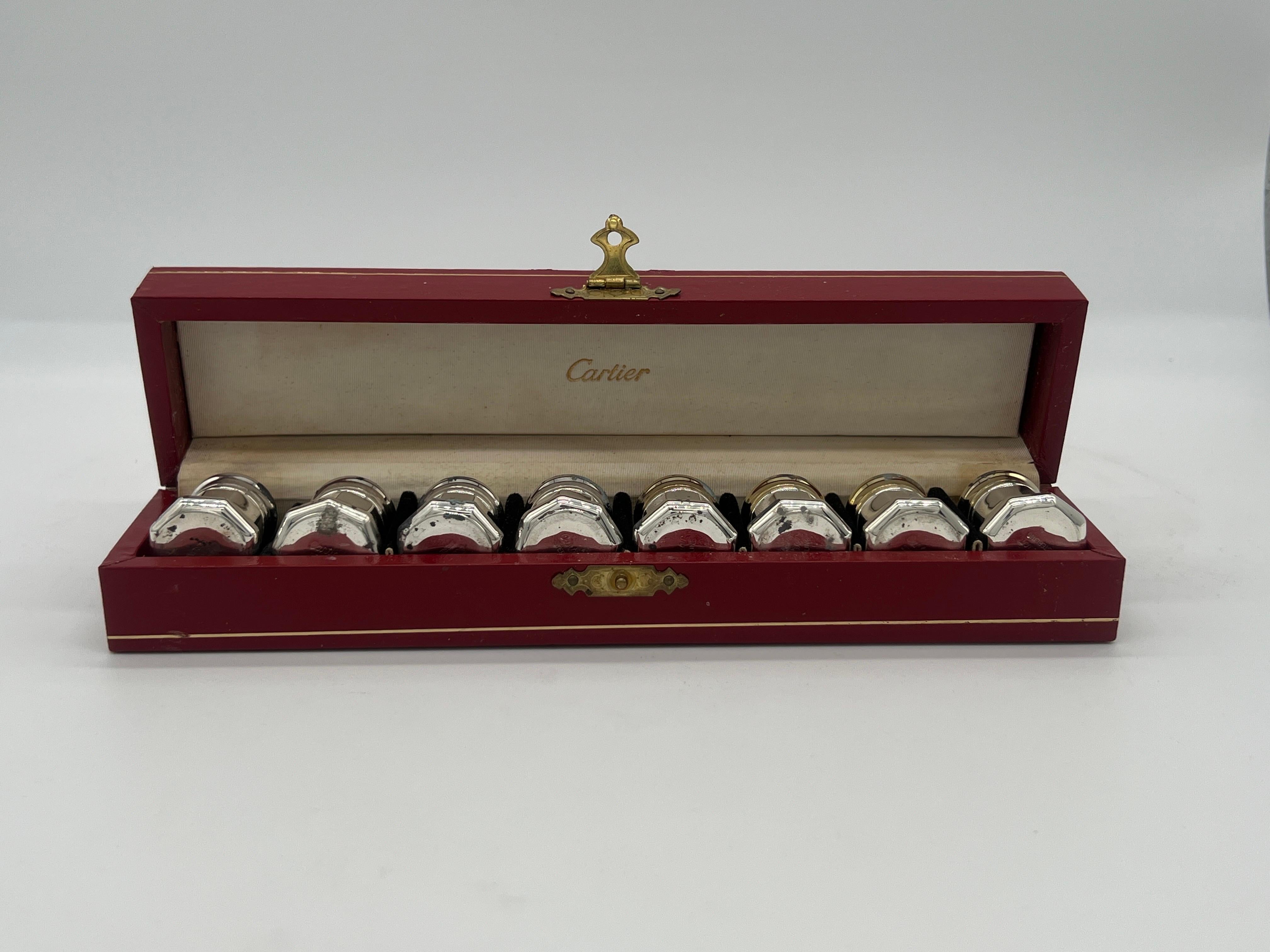 Cartier, circa 1990.

A set of 8 Cartier Sterling silver salt and pepper shakers. 4 of the shakers have a vermeil surface and are each marked Cartier Sterling to underside. Accompanied with original box.

Each measure 1.375