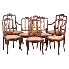 Set of Eight Carved Dining Chairs