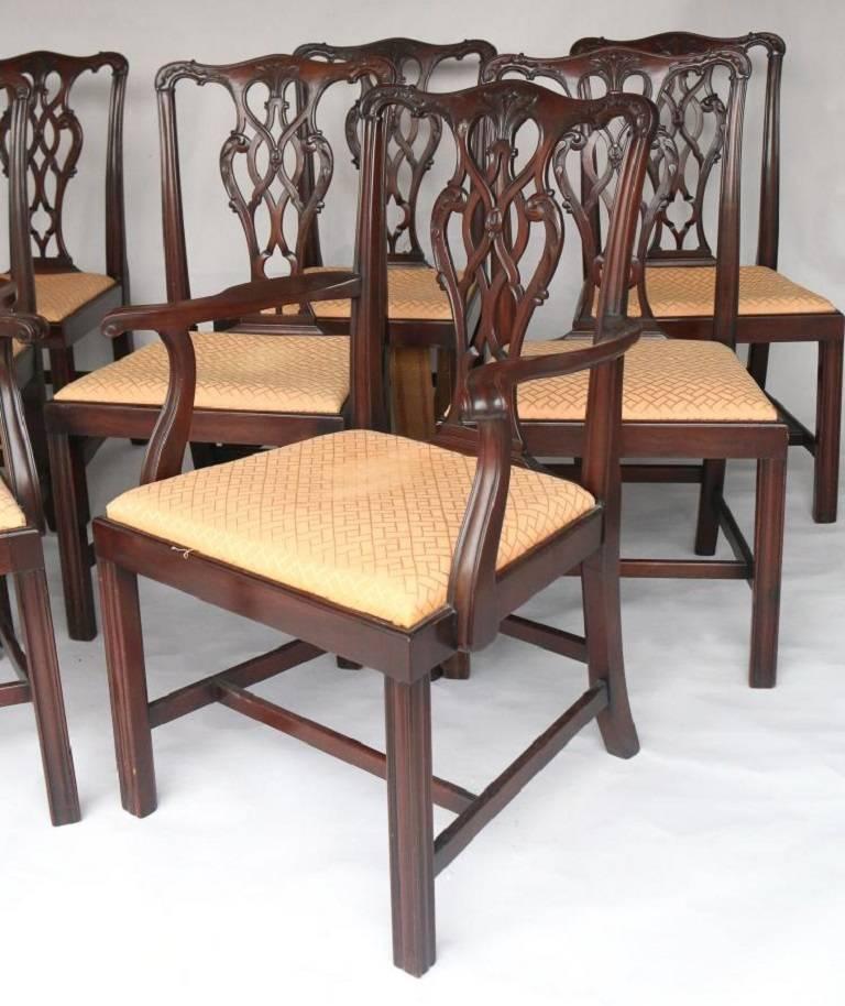 A well executed set of carved mahogany Chippendale style dining chairs, consisting of two arm, and six side chairs.