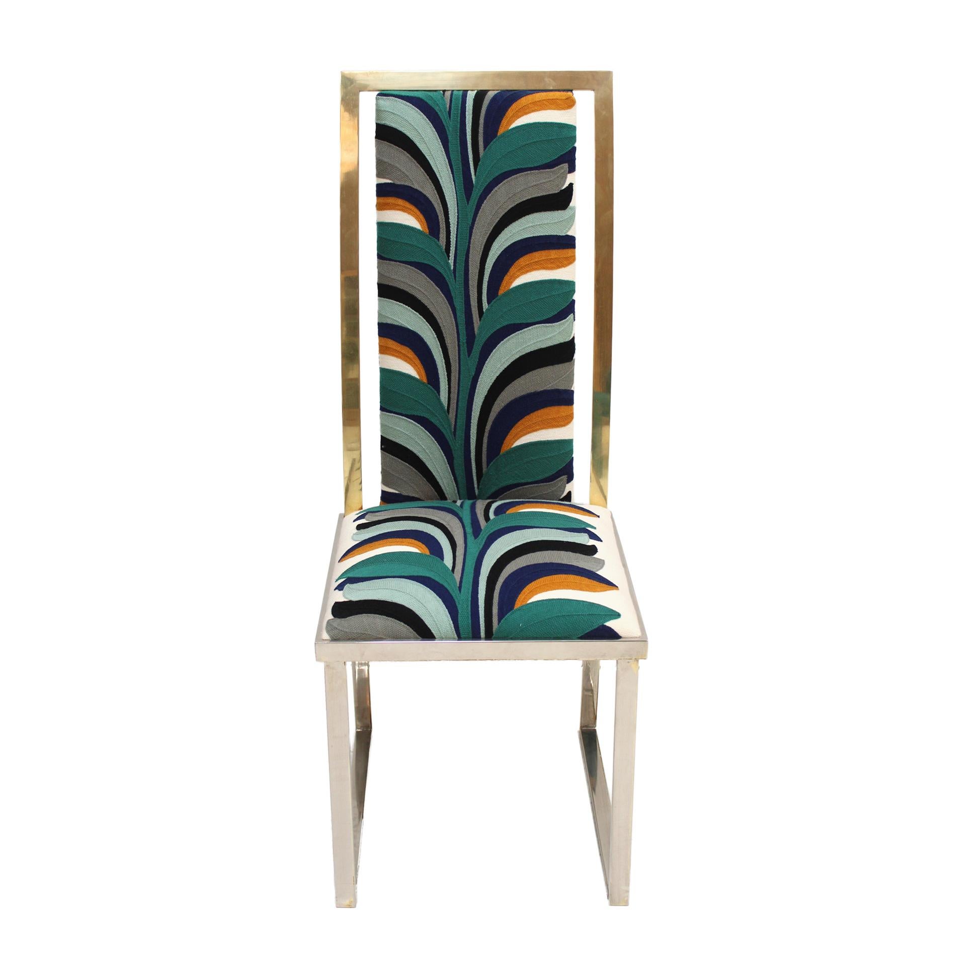 Set of eight chairs designed by Michel Mangematin with steel and brass structure, upholstered in cotton with coloured feather embroidery. France 1970s.

Every item LA Studio offers is checked by our team of 10 craftsmen in our in-house workshop.