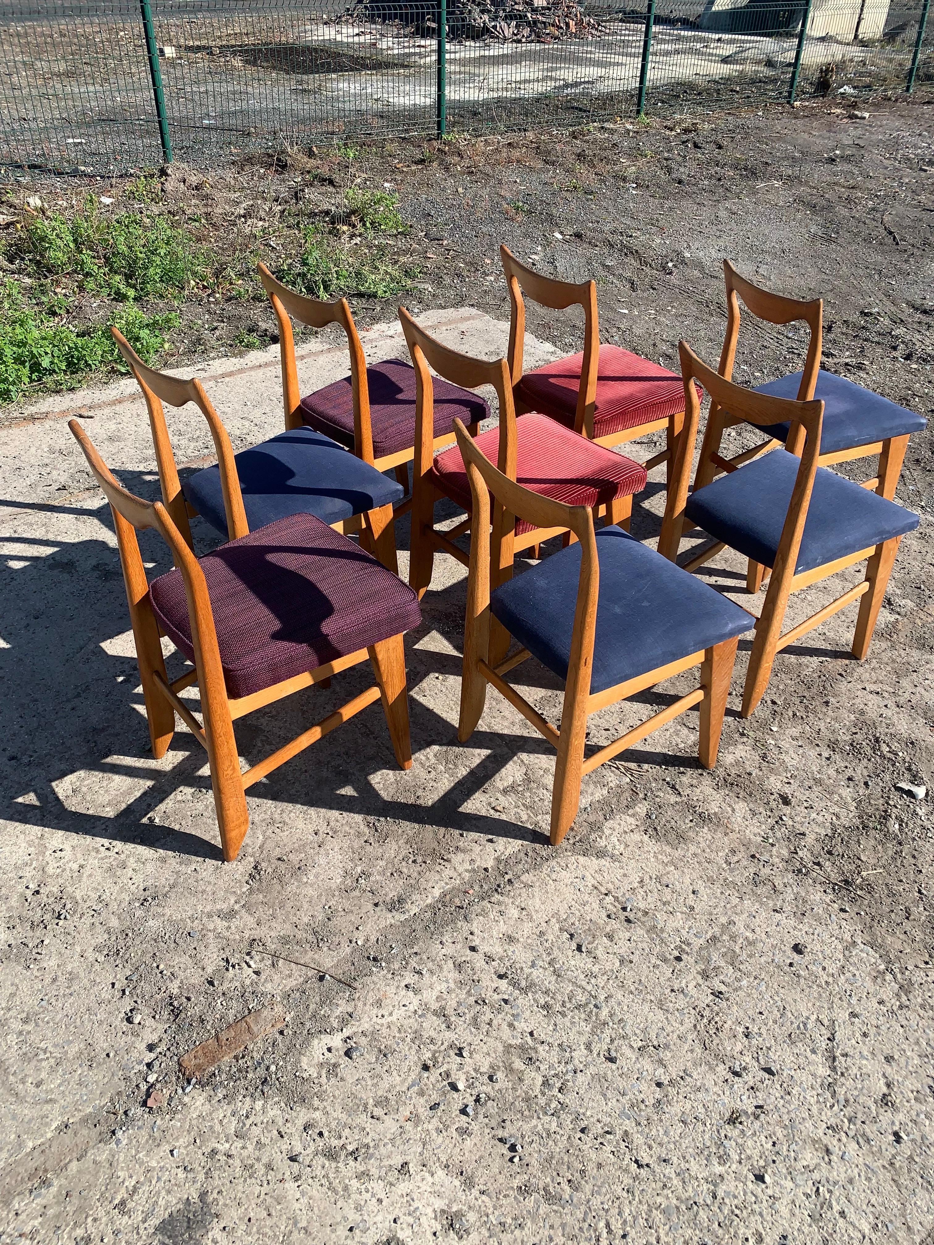 A set of 8 solid eight oak chairs by Guillerme et Chambron Edition Votre Maison