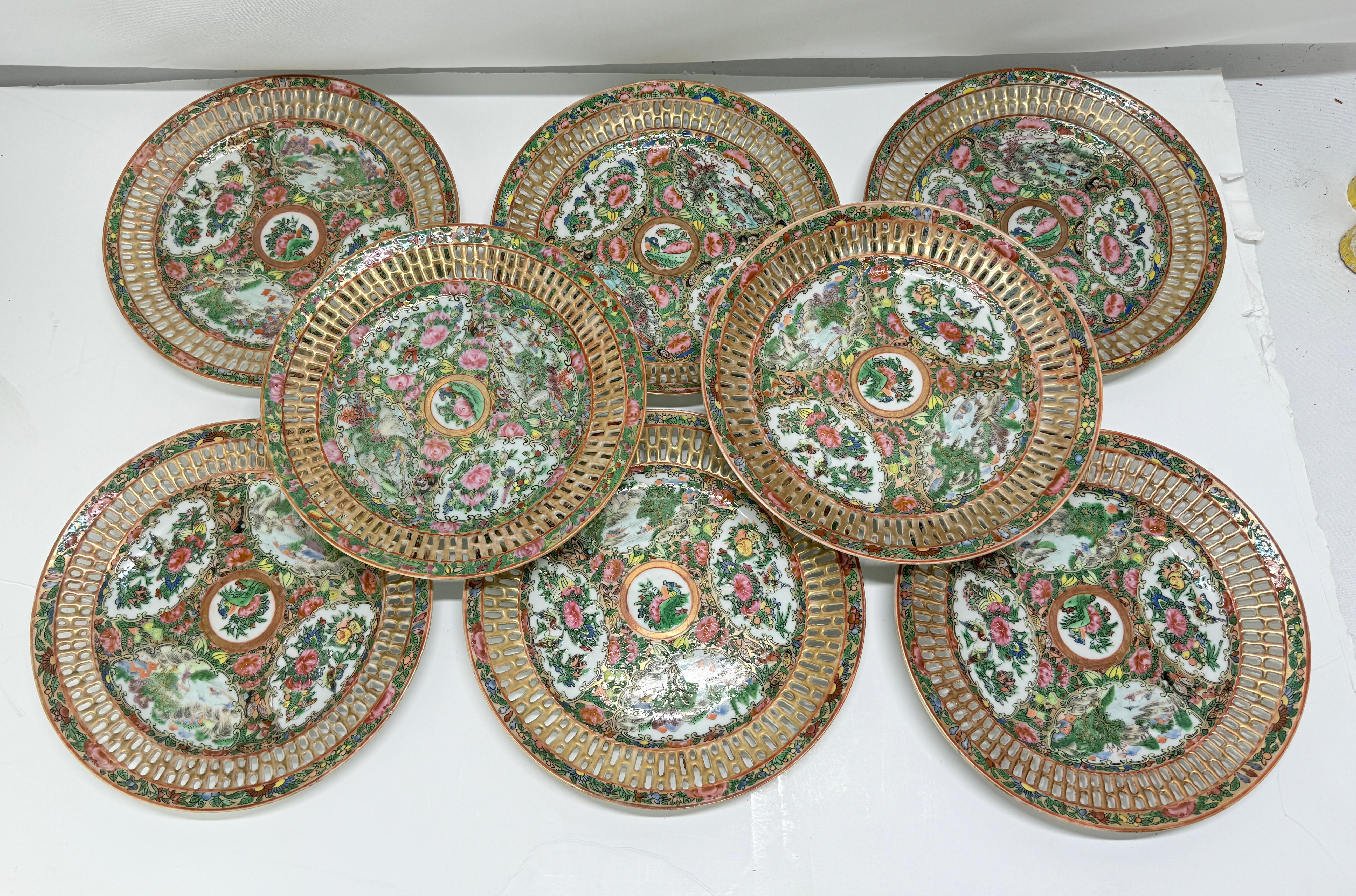 This is listing #1 of 2 available sets of 8. 

A vibrant and meticulously hand-painted set of eight Chinese Export porcelain plates, dating to the mid-to-late 19th century, executed in the classic Rose Medallion pattern. Each plate measures