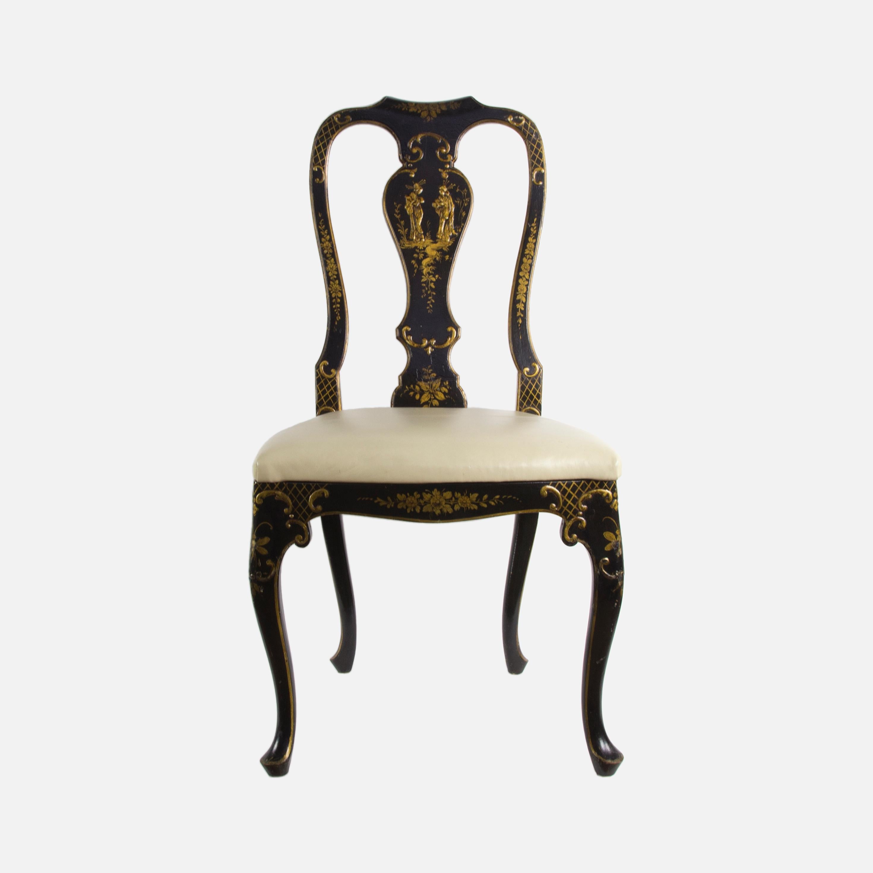 Set of eight Chippendale Asian style hand-painted ebonized dining room chairs; hand-painted and gilt highlights in a classic chinoiserie theme on ebonized black background; cream leather seats. Each side chairs measures approx. 18