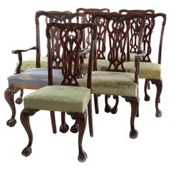 Conjunto de ocho sillas de comedor de caoba tallada estilo Chippendale, Circa 1900