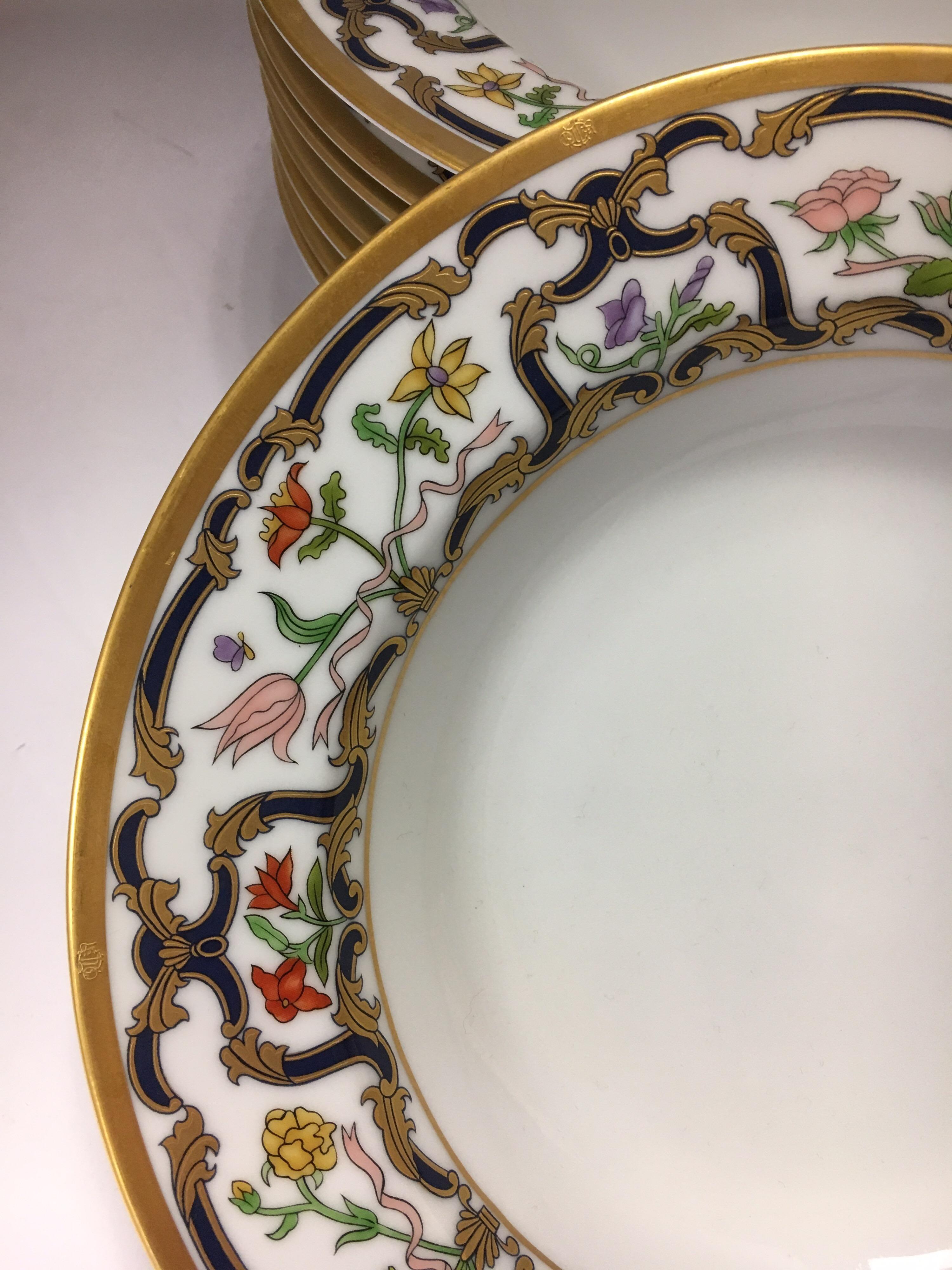 Rare, coveted and out of production Christian Dior fine porcelain china. The pattern is Renaissance and
it features the famed blue and gold scrolls and floral rim. The set was in production from 1990-1999 and then was discontinued, making this