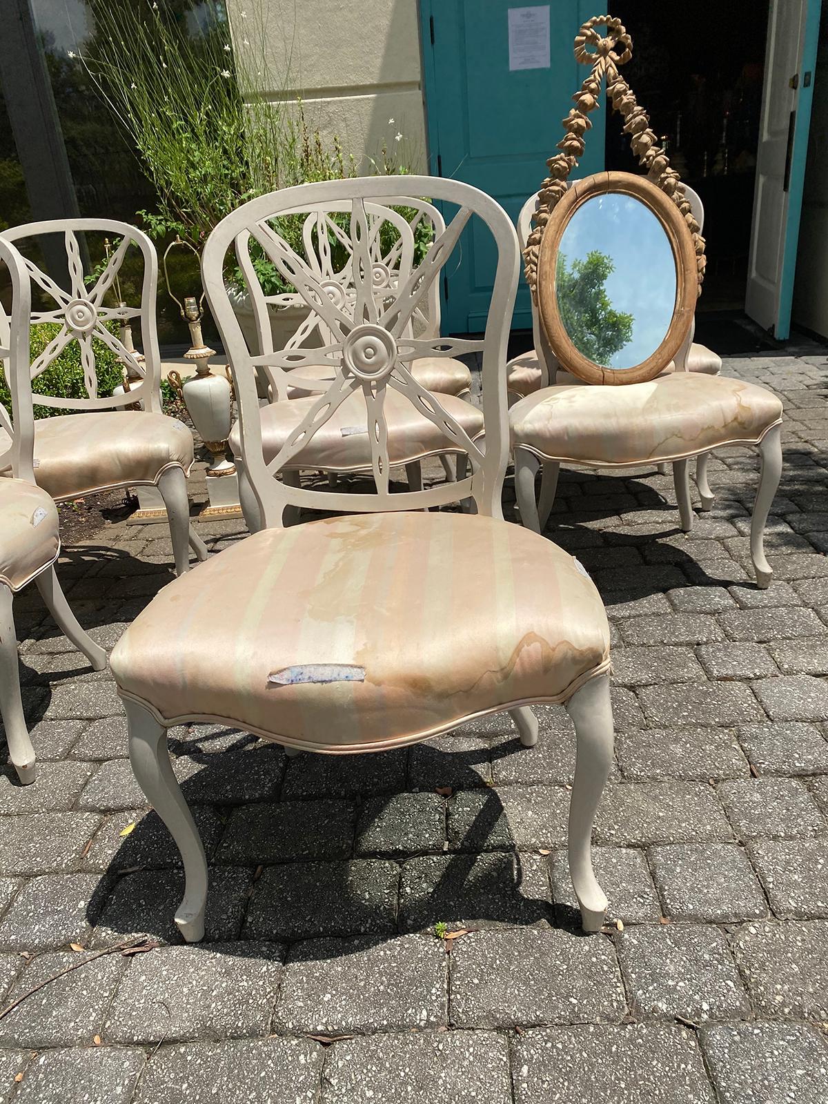 Set of eight 20th century circa 1940s-1960s modified wheelback dining chairs with wide seat. Classic take on a Georgian chair. Light and airy.