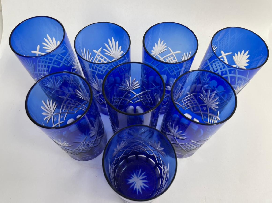 Set of eight highball cobalt blue crystal glasses.
Exquisite Bohemian crystal style cut Czech drinking rock glasses tumbler set of four.
The vibrant hand blown rich sapphire blue jewel sapphire blue crystal glass is cut to clear to reveal a lovely