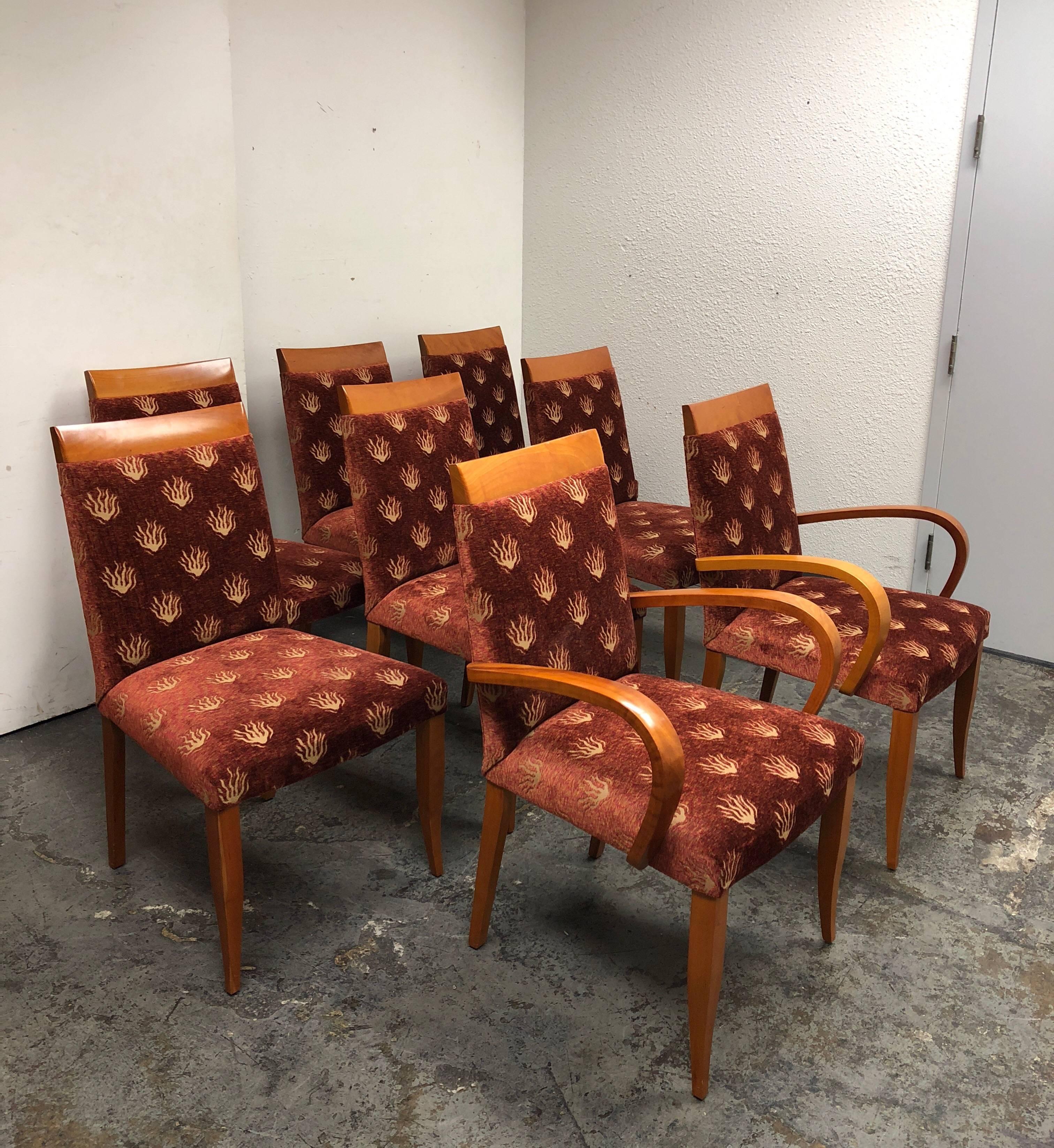 A set of eight Dakota Jackson PFM Royal seating chairs. Two armchairs and six side chairs. Cherry finish with fabric covered seat and back. Originally purchased from Randolph and Hein showroom in San Francisco. Measures: Arm height 27 inches, seat