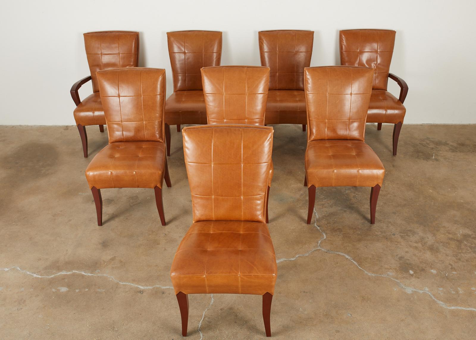 Magnificent set of eight leather dining chairs designed by Dakota Jackson. Known as puff chairs set consists of six side chairs and two armchairs. They feature a tufted leather pillow back in a rich cognac finish. The hardwood frames have a