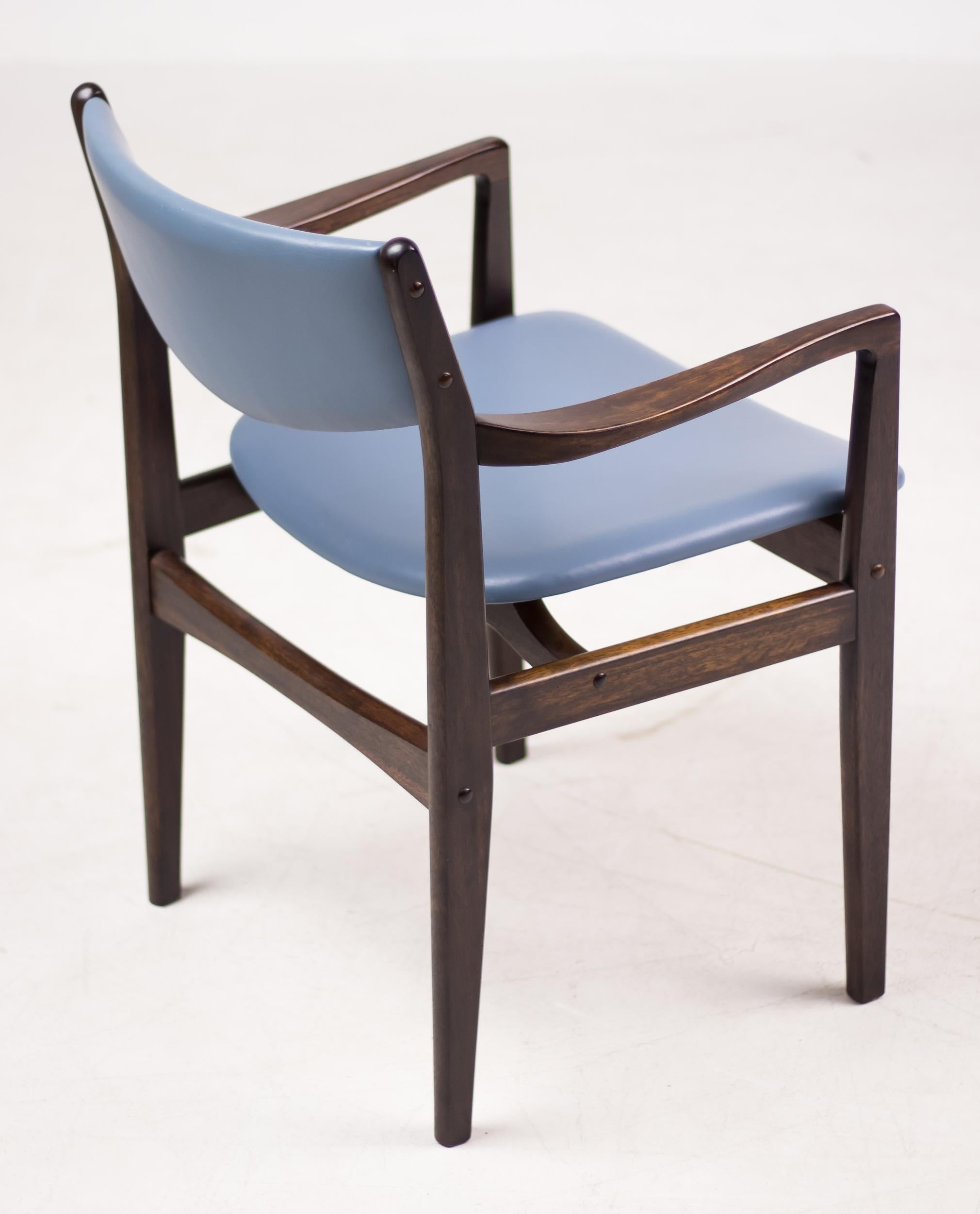 Set of Eight Danish Armchairs in Mahogany and Baby Blue Leather 4