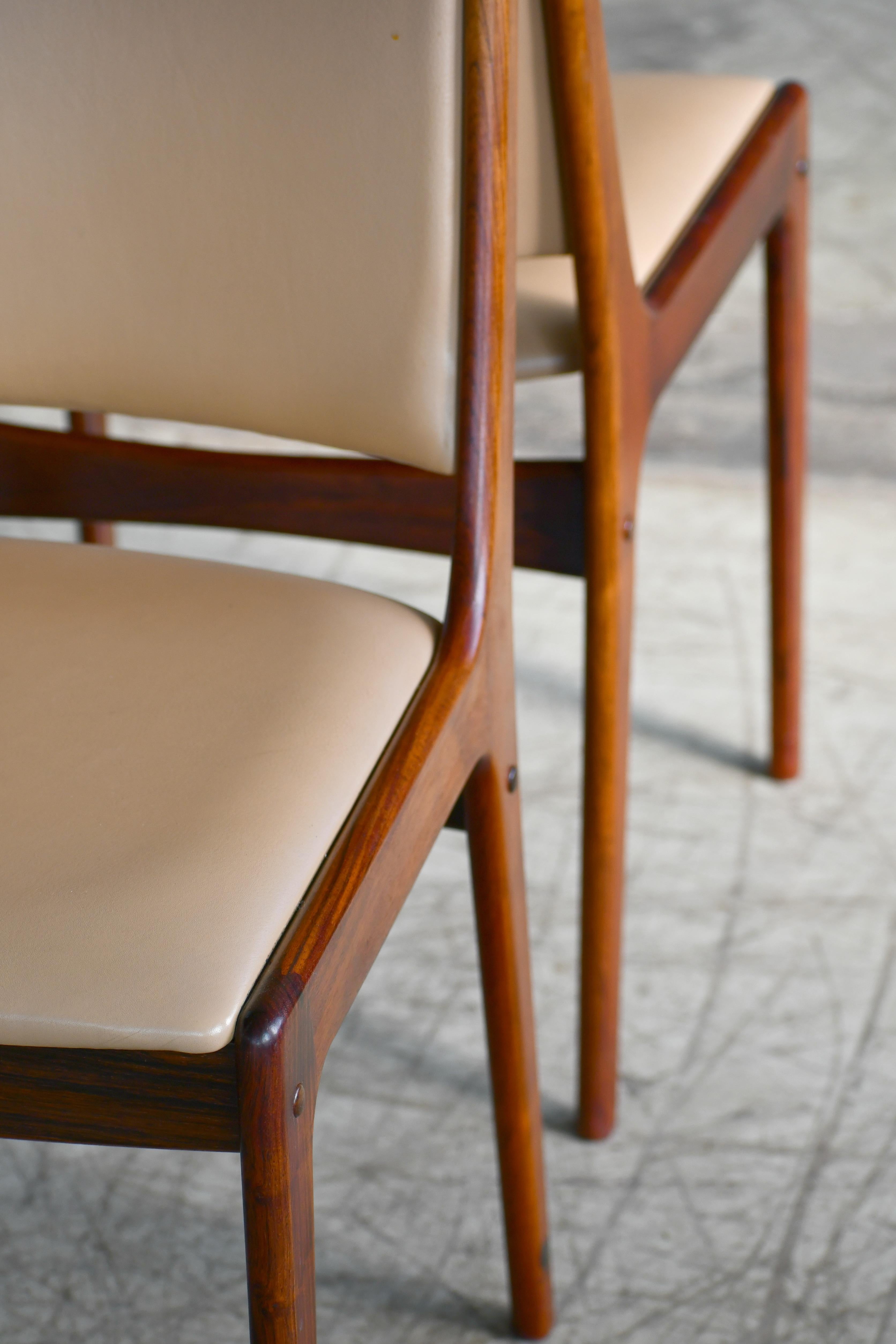 Set of Eight Danish Dining Chairs in Rosewood and Tan Leather by Johs Andersen 1