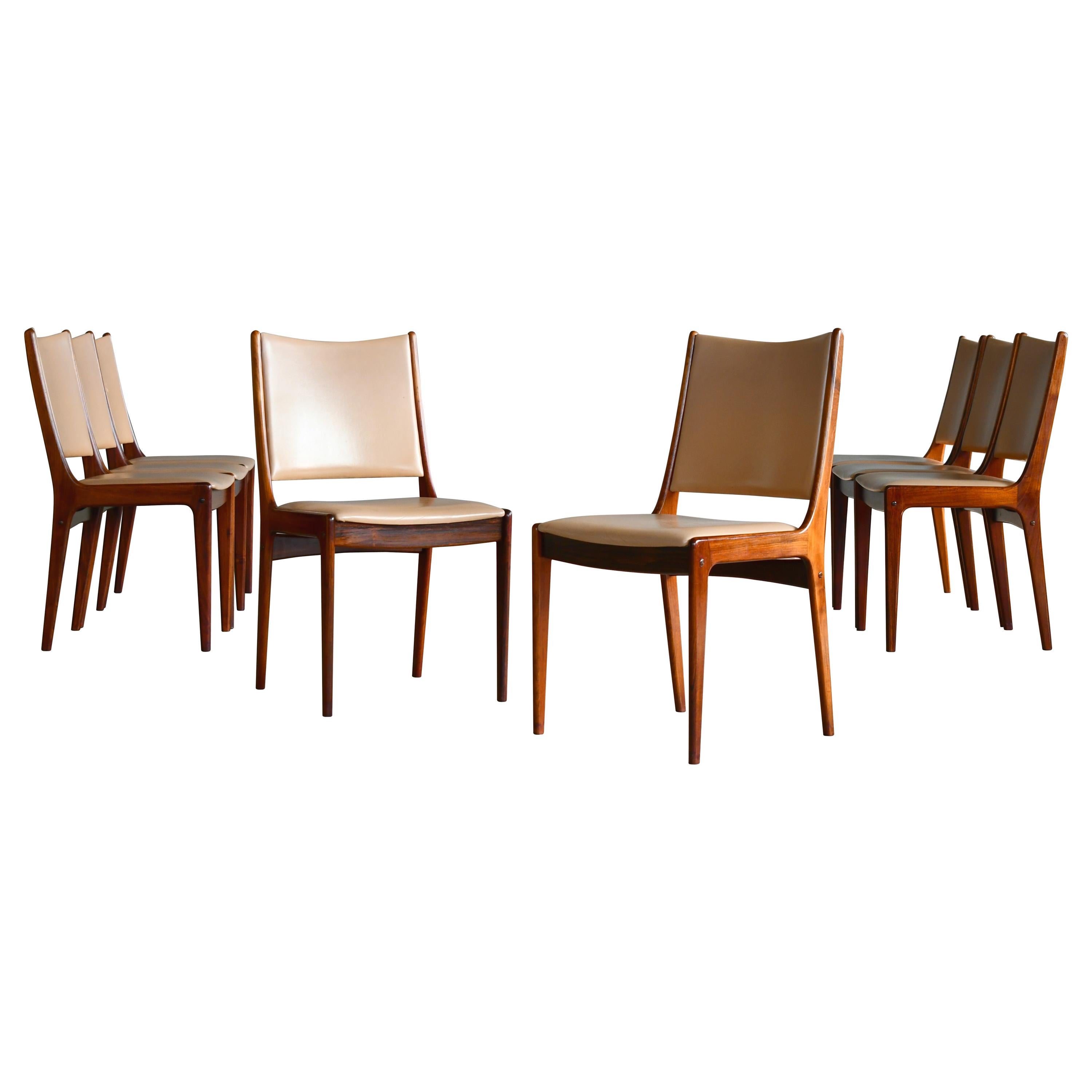 Set of Eight Danish Dining Chairs in Rosewood and Tan Leather by Johs Andersen