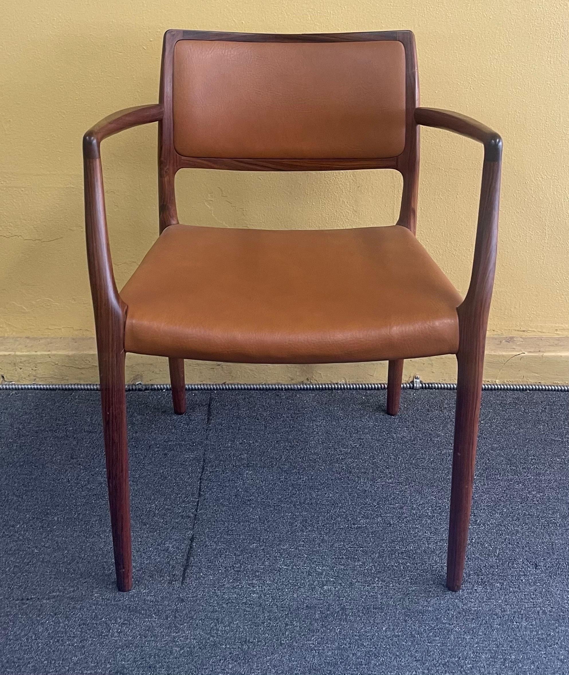 Set of Eight Danish Modern Rosewood Model 65 Arm Chairs by Niels Moller 4