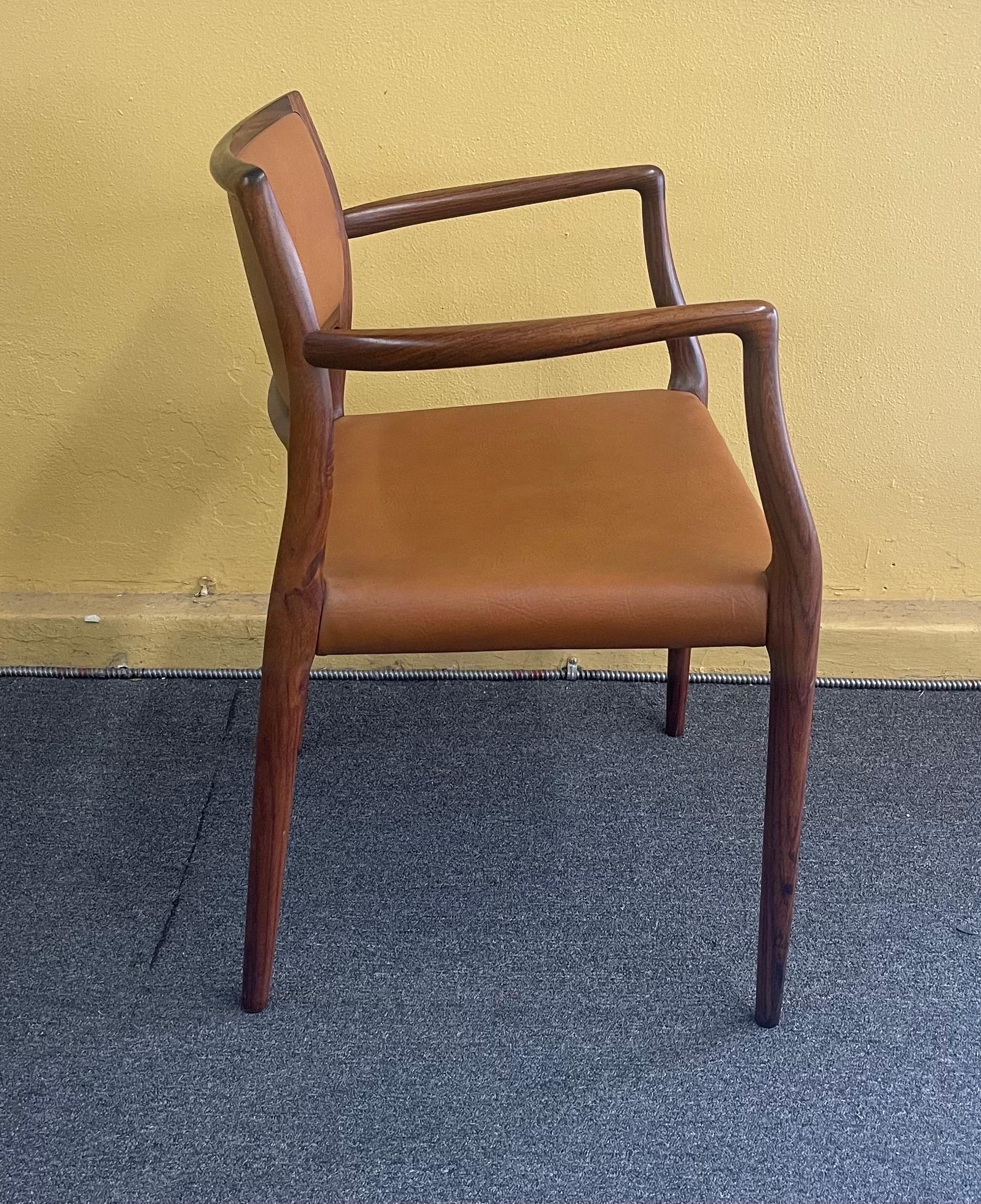 Set of Eight Danish Modern Rosewood Model 65 Arm Chairs by Niels Moller 5