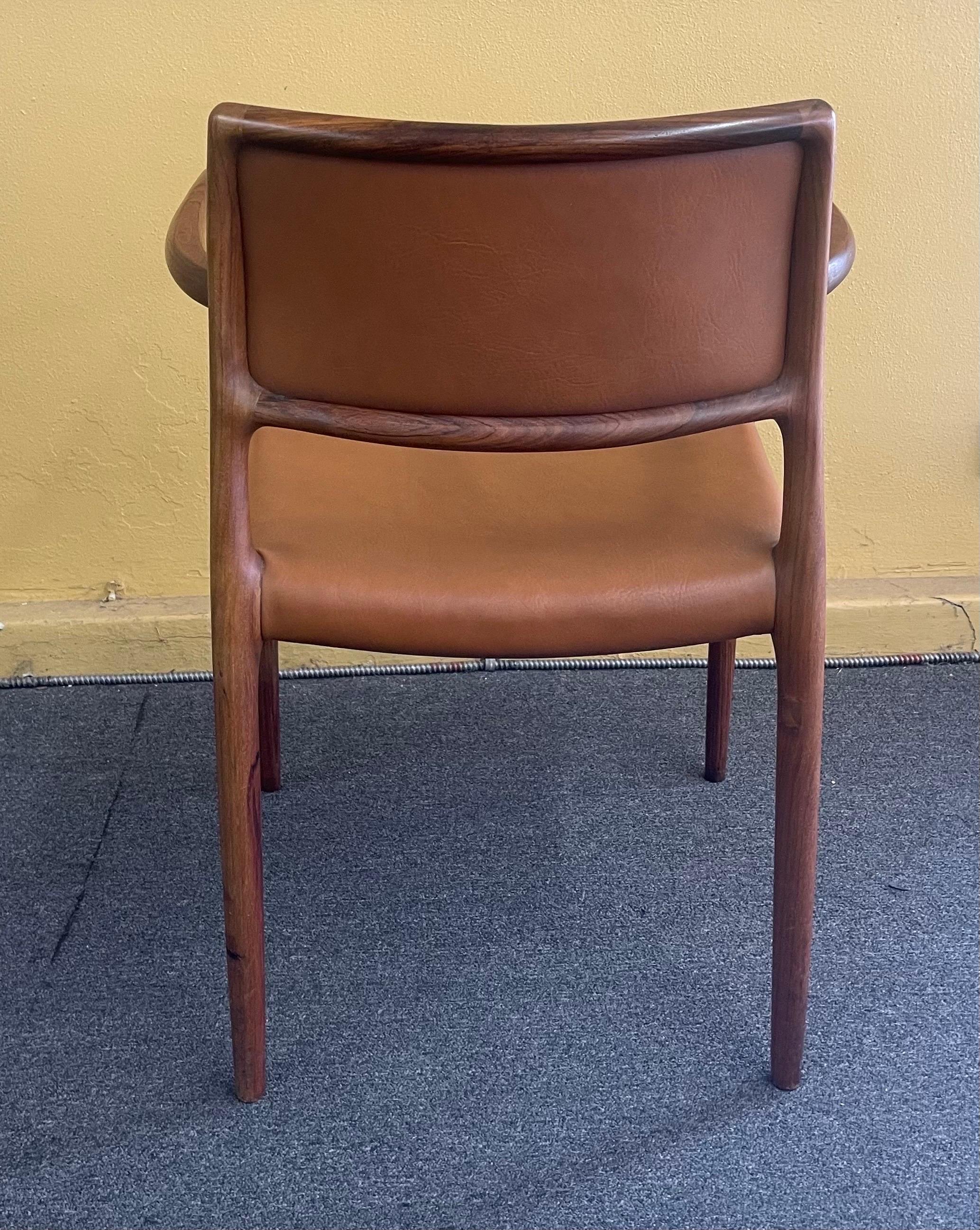 Set of Eight Danish Modern Rosewood Model 65 Arm Chairs by Niels Moller 7