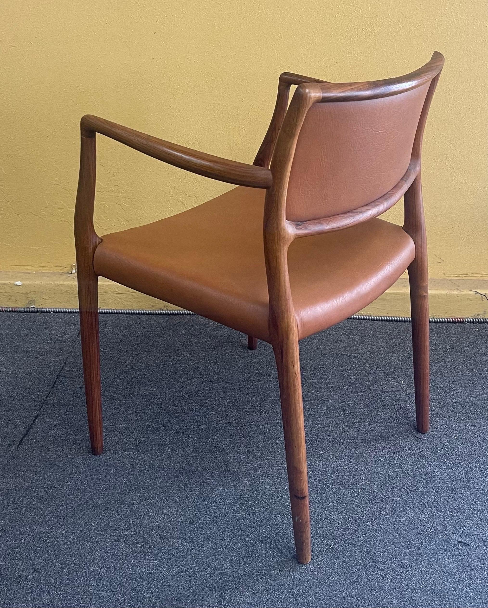 Set of Eight Danish Modern Rosewood Model 65 Arm Chairs by Niels Moller 8
