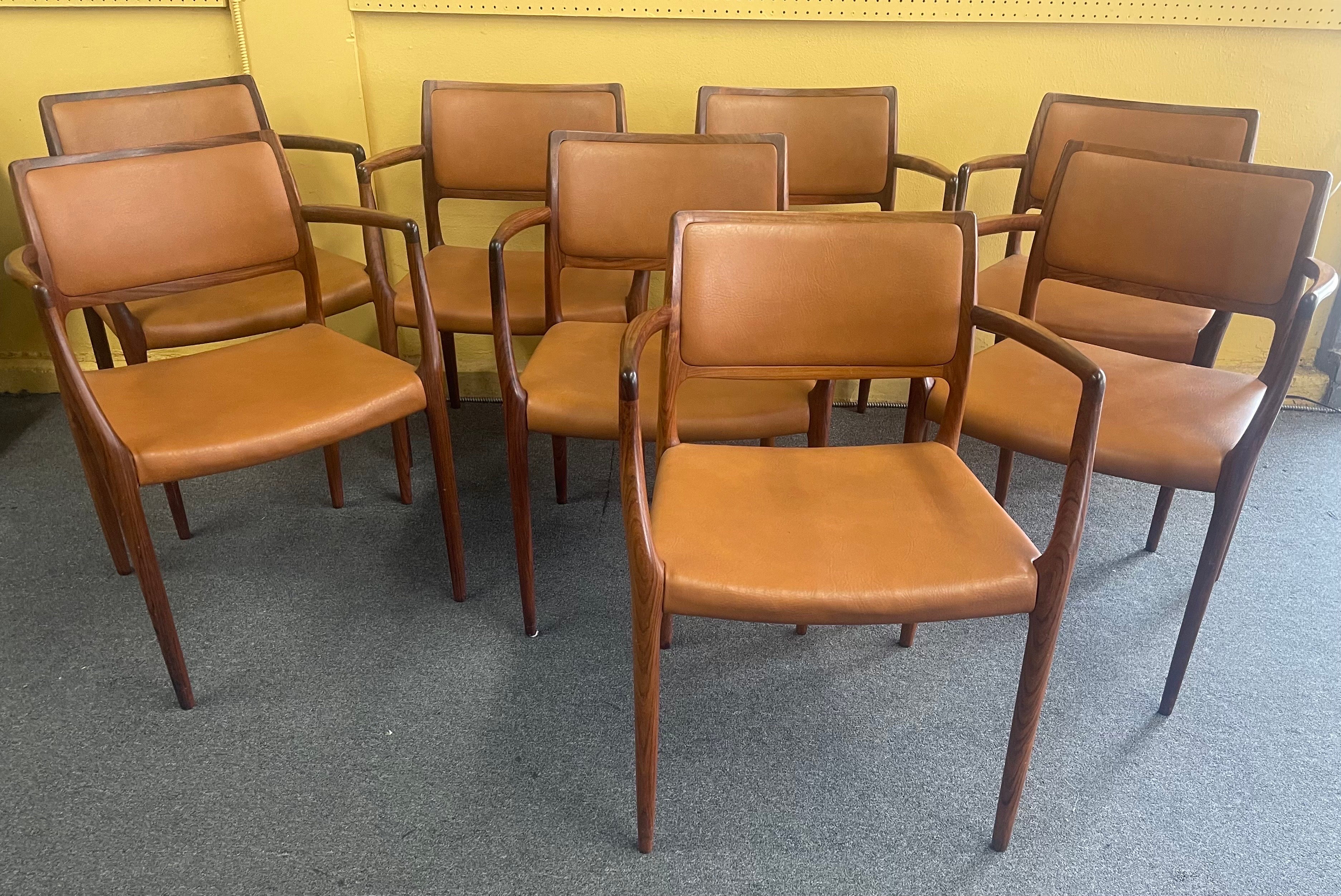 Set of Eight Danish Modern Rosewood Model 65 Arm Chairs by Niels Moller 12