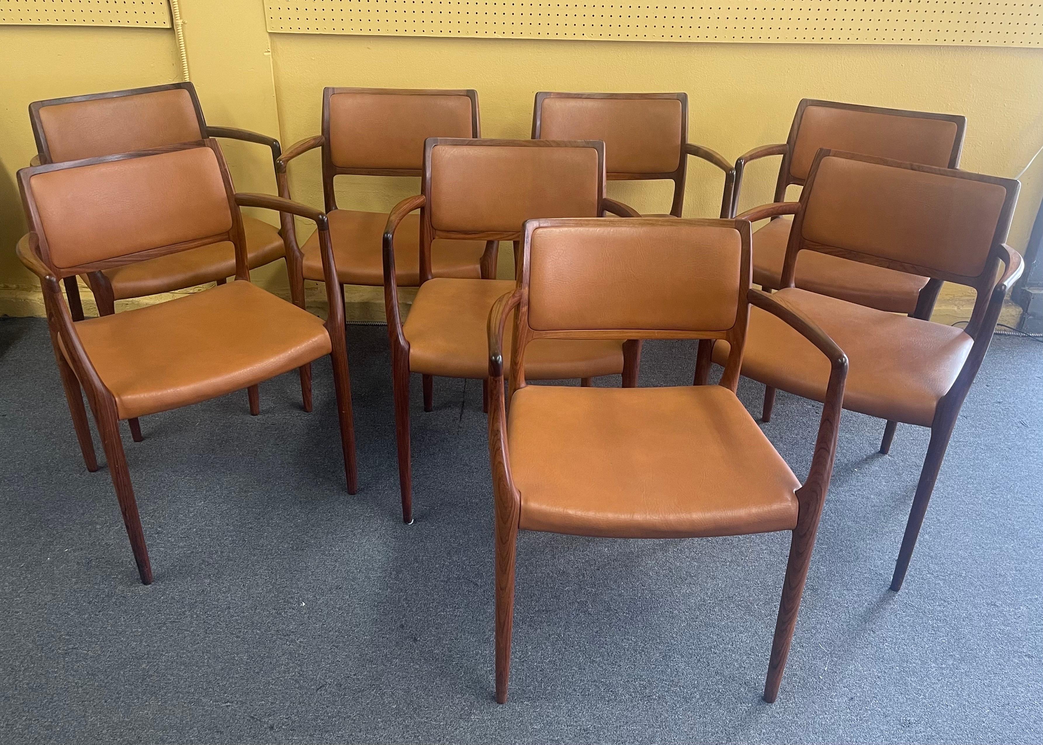 Scandinavian Modern Set of Eight Danish Modern Rosewood Model 65 Arm Chairs by Niels Moller