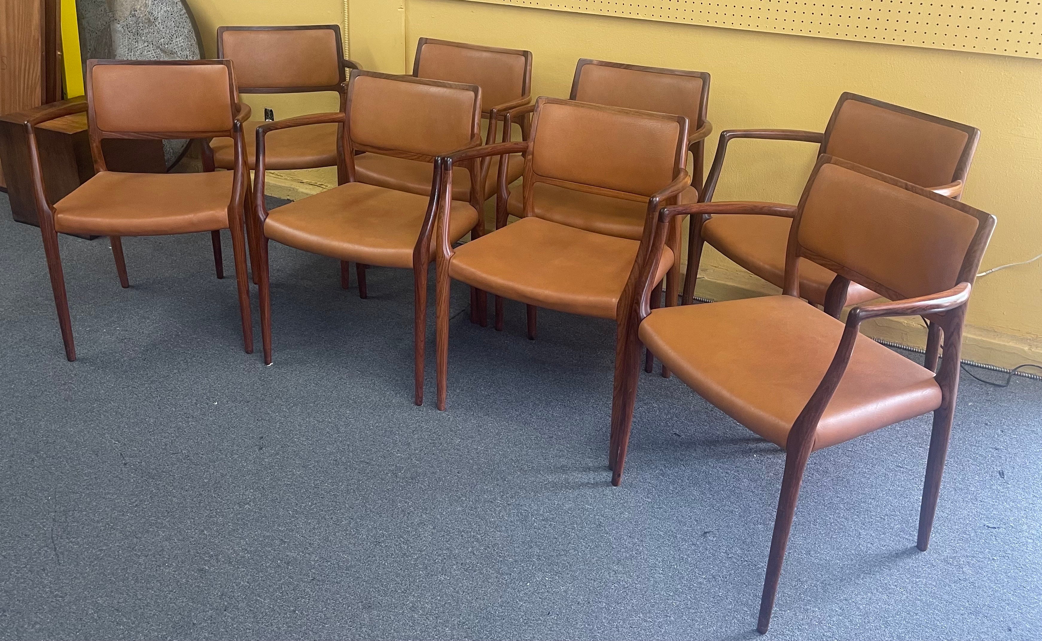 20th Century Set of Eight Danish Modern Rosewood Model 65 Arm Chairs by Niels Moller