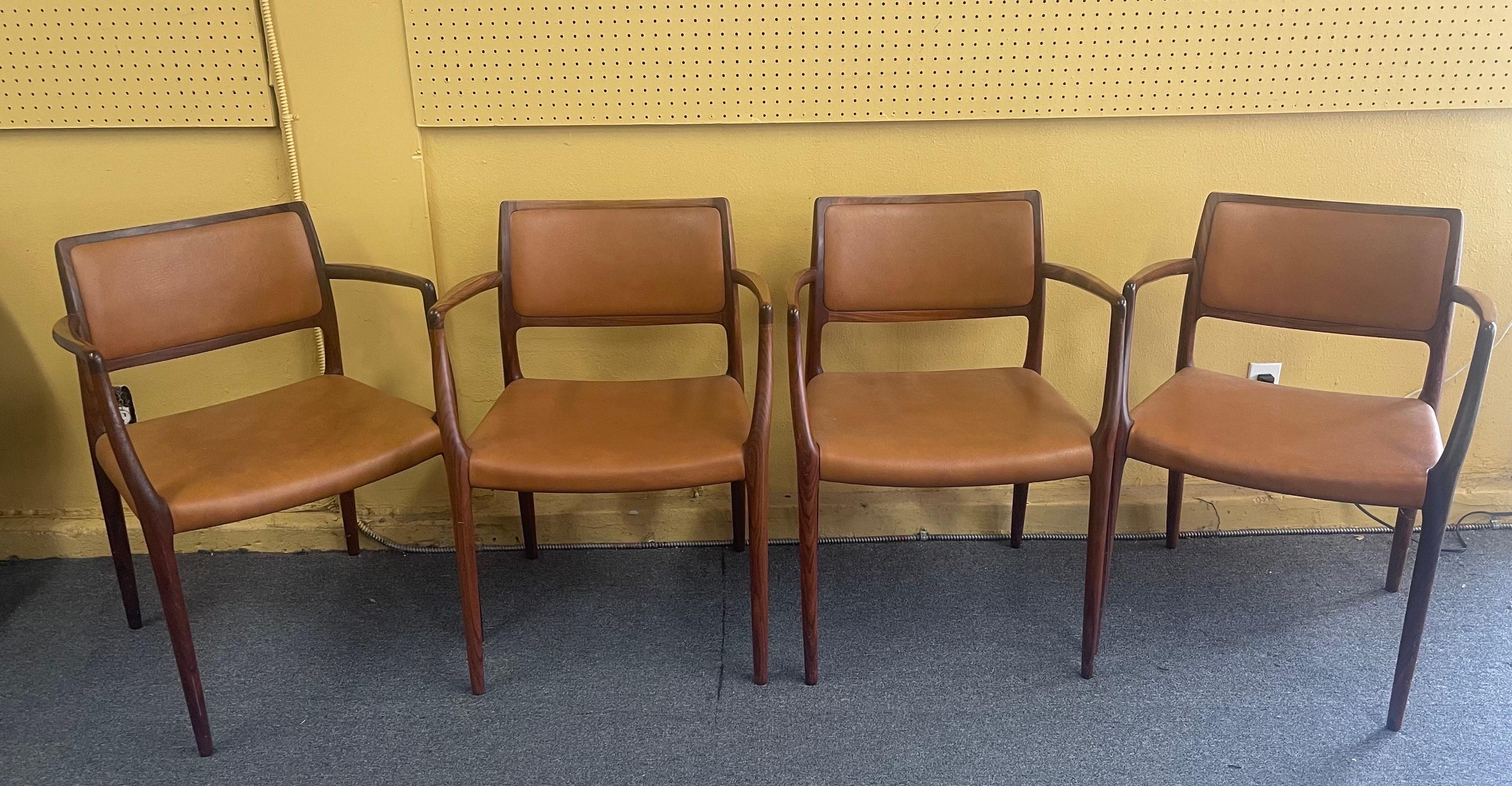 Leather Set of Eight Danish Modern Rosewood Model 65 Arm Chairs by Niels Moller
