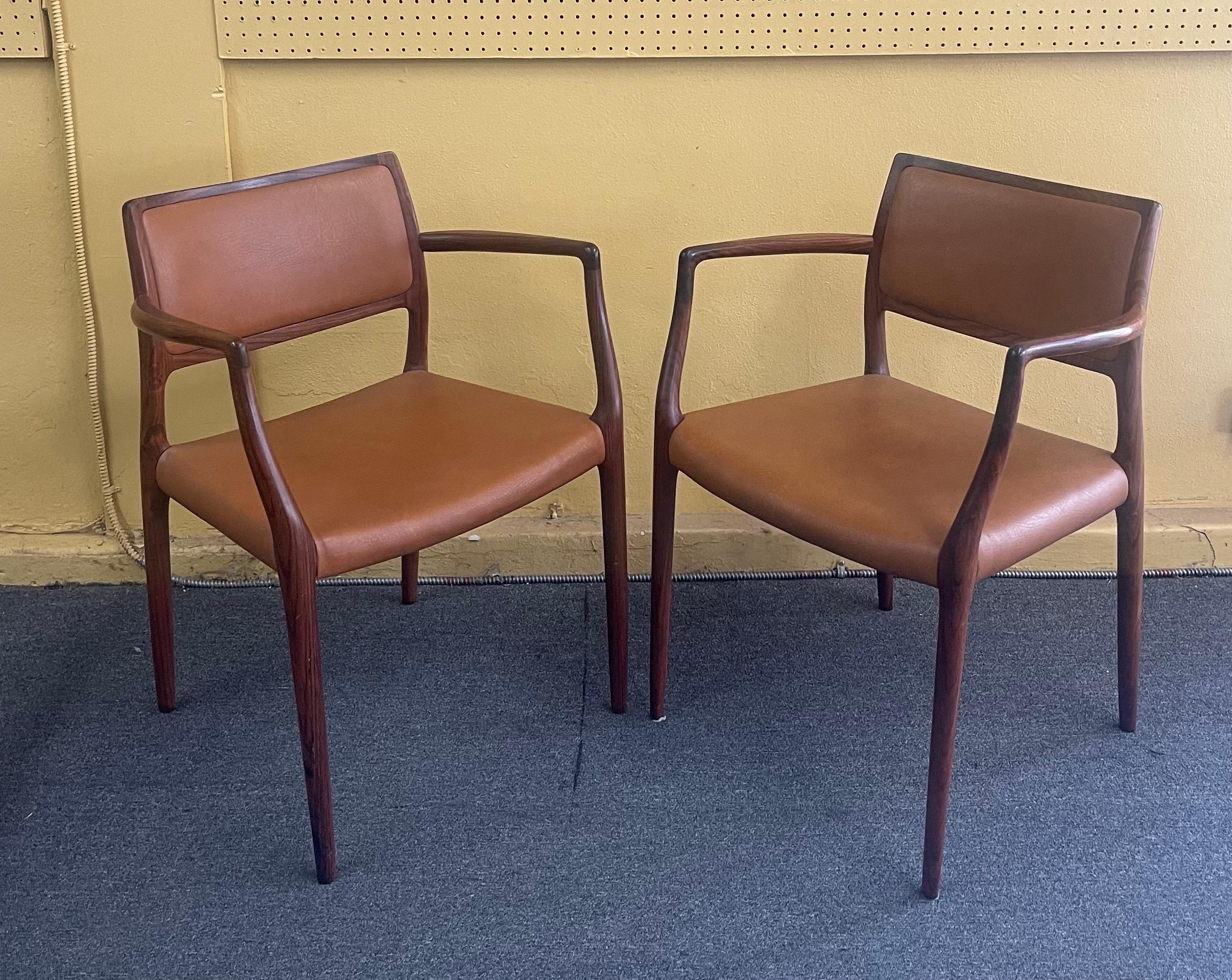 Set of Eight Danish Modern Rosewood Model 65 Arm Chairs by Niels Moller 3