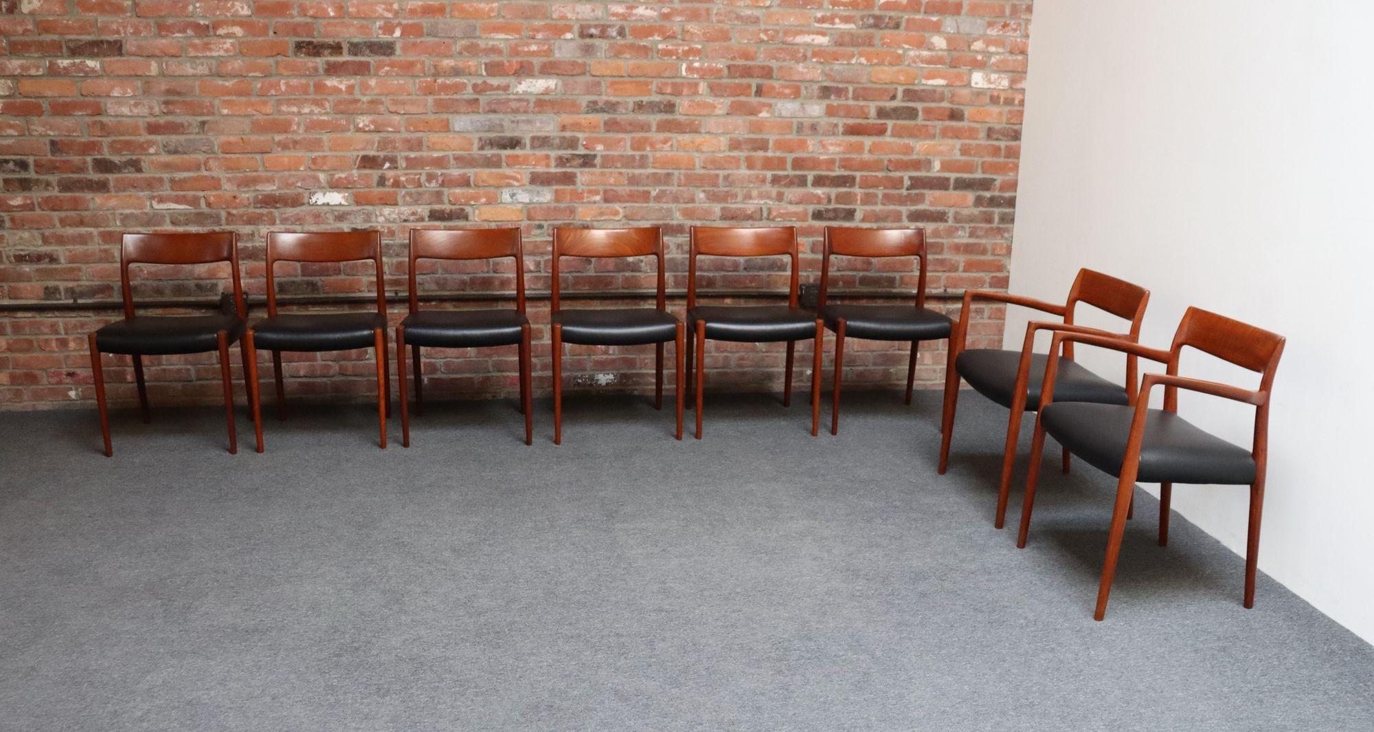 Set of eight dining chairs (two captains model #57 and six side model #77) in teak designed in 1959 by Niels Ole Møller for J.L. Møllers Møbelfabrik of Denmark.
Early examples (ca. early 1960s) with sculptural teak frames boasting vivid grain and