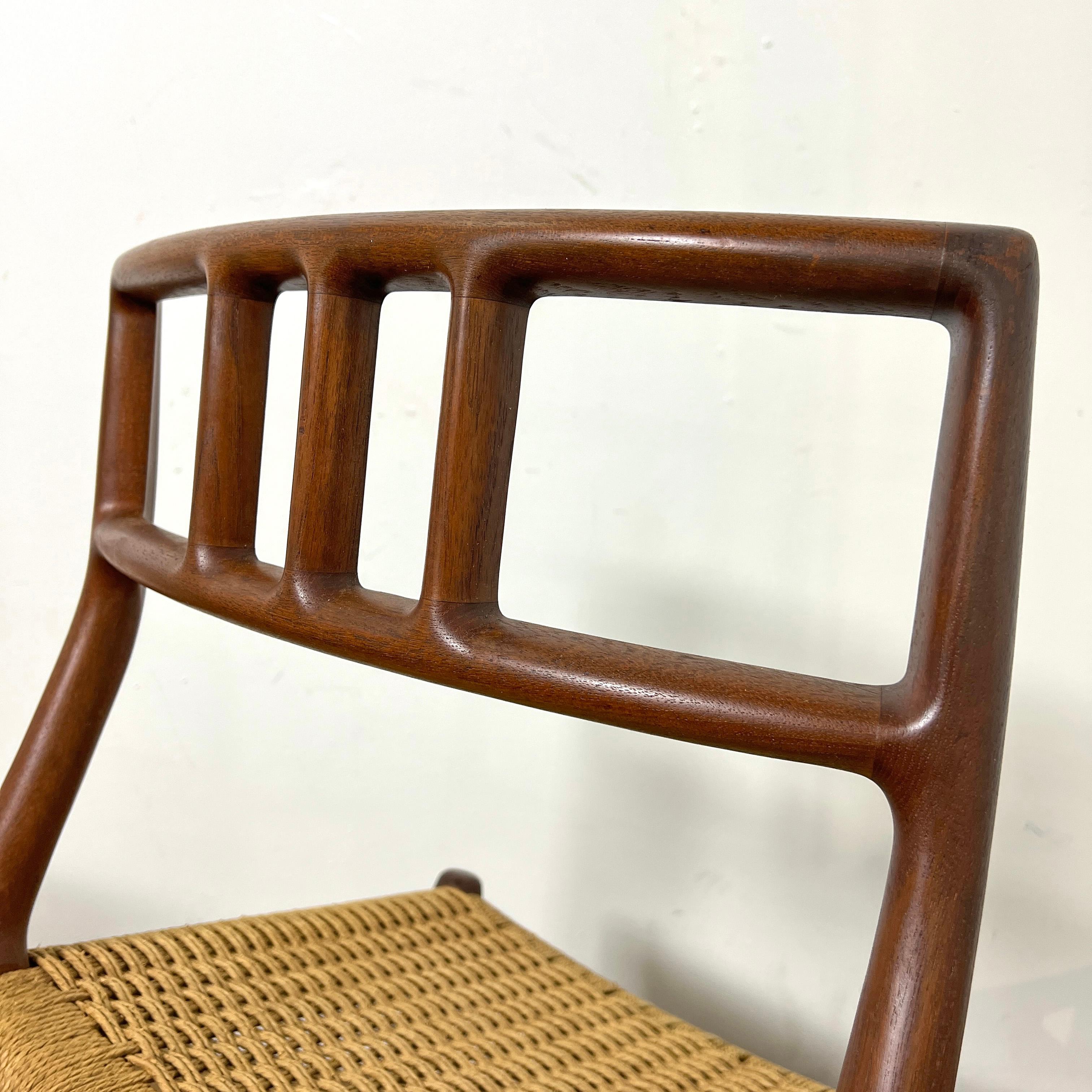 Set of Eight Danish Teak Dining Chairs by Niels Moller for JL Moller Circa 1960s 1