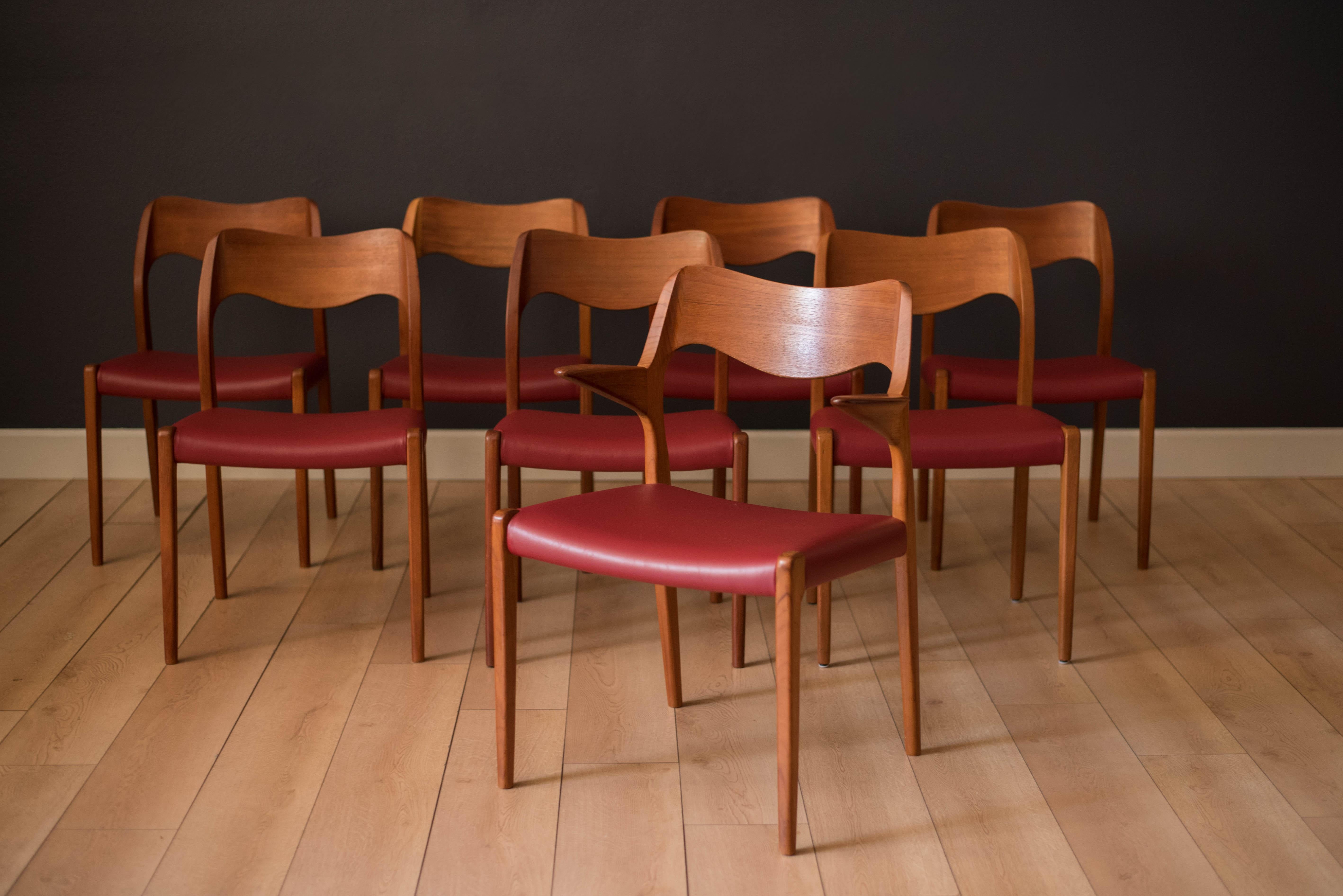 Mid century set of eight Danish dining chairs by Niels Møller for J.L. Møller Møbelfabrik in teak. Set includes seven model 71 chairs and one 55 armchair. Seats are covered in red leatherette. Price is for the set. 


Captain chair: 21.75