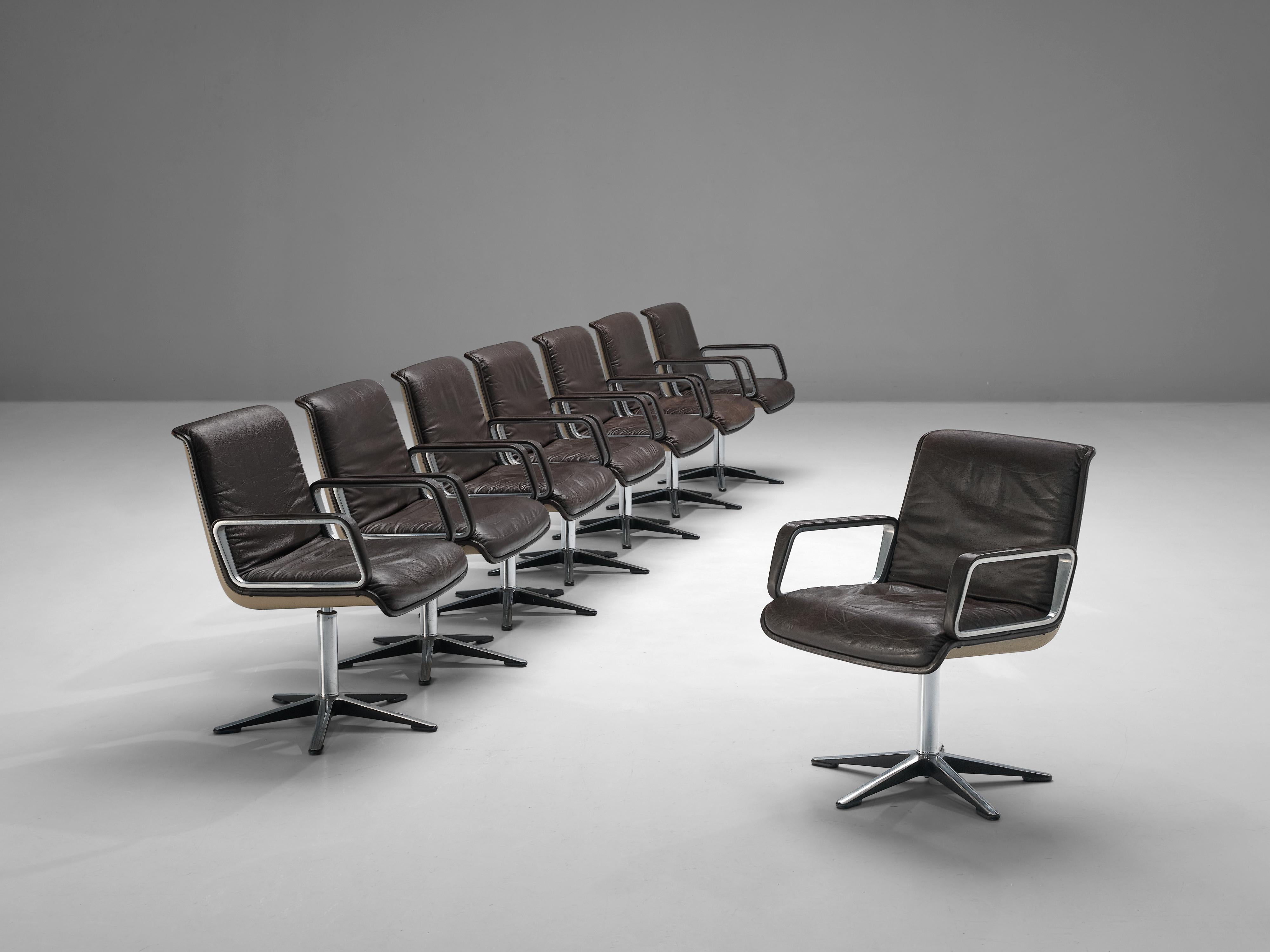 Delta Design for Wilkhahn, office chairs, leather, aluminum, plastic, metal, Germany, 1970s

Comfortable German office chairs with padded leather seats. The shell of these chairs is made in a light brown plastic. The five star base and armrests are