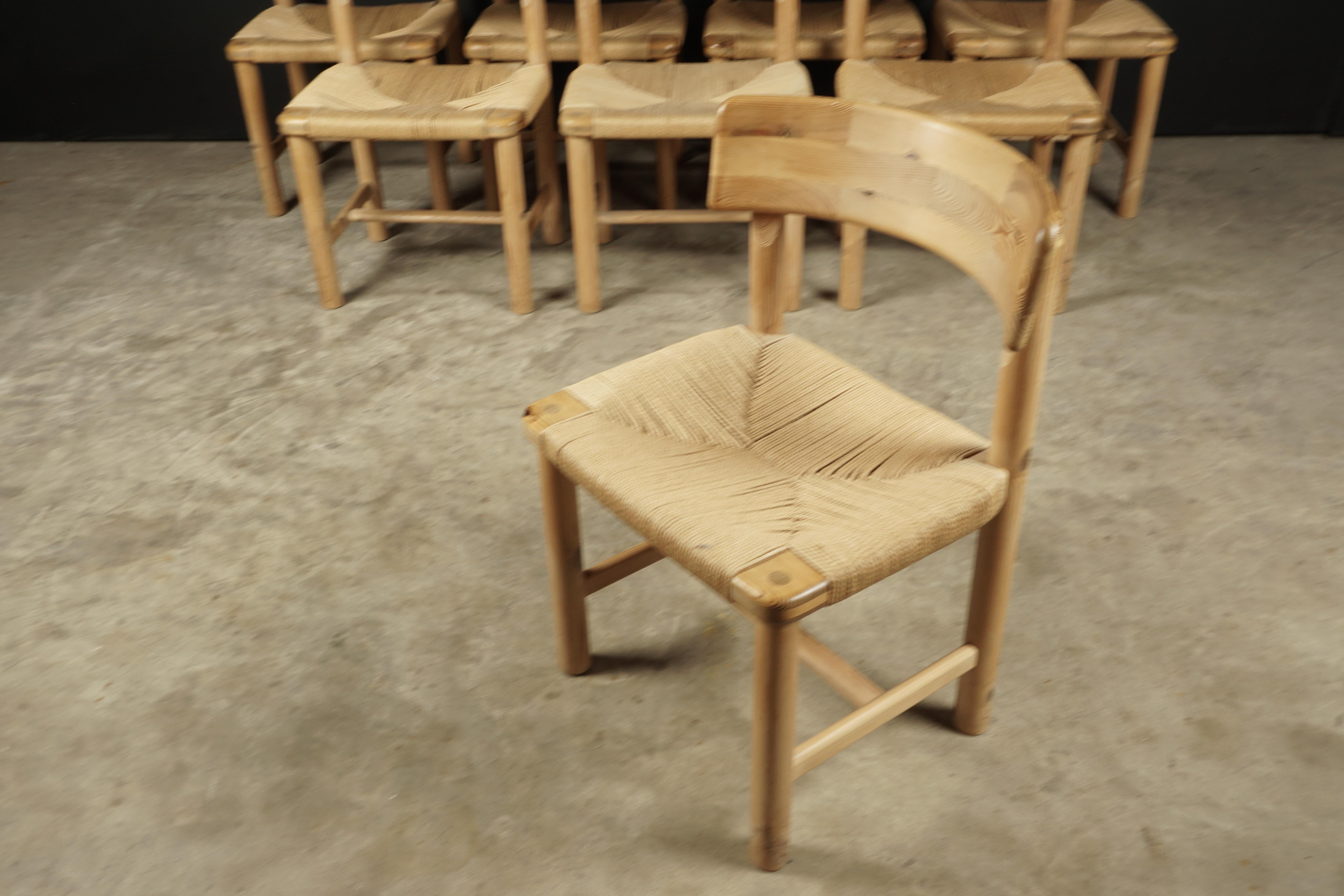Set of eight dining chairs attributed to Renier Daumiller, Denmark, circa 1970. Solid pine construction with original rush seats.
