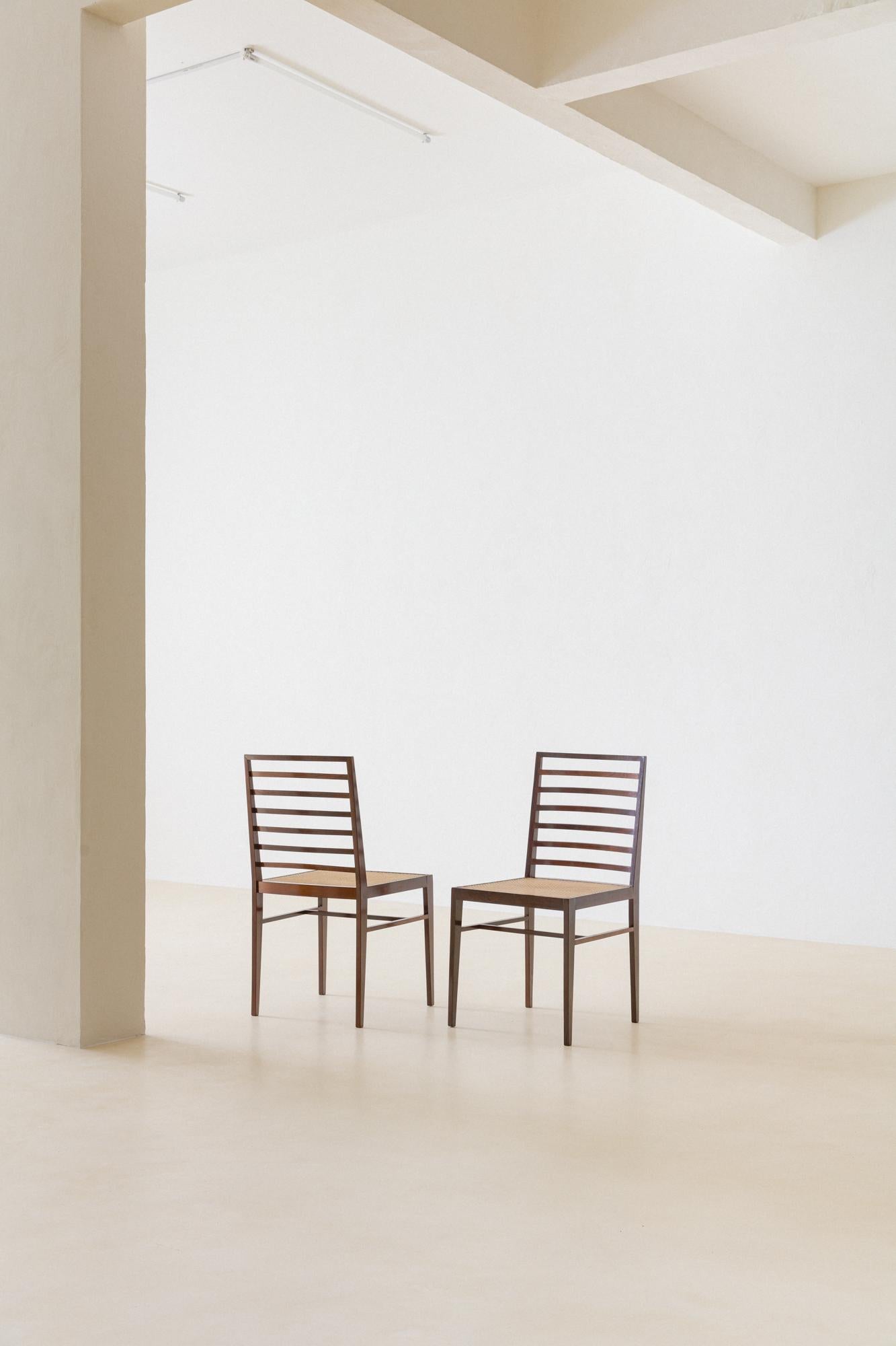 Mid-Century Modern Set of Eight Dining Chairs by Joaquim Tenreiro, Rosewood and Cane, 1950s, Brazil For Sale