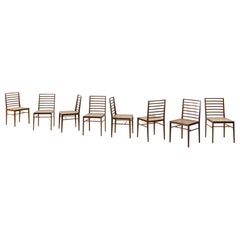 Conjunto de ocho sillas de comedor de Joaquim Tenreiro, palisandro y caña, años 50, Brasil