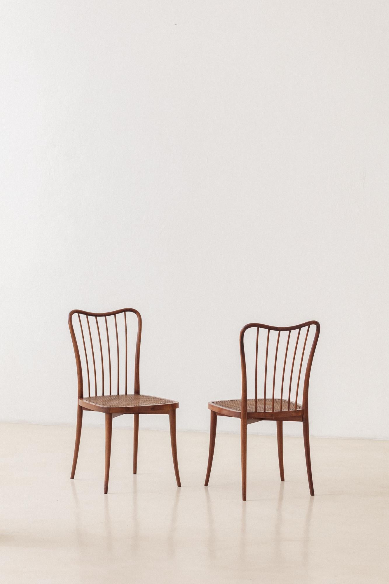 Mid-Century Modern Set of Eight Dining Chairs by Joaquim Tenreiro, Solid Wood and Cane, 1950s For Sale