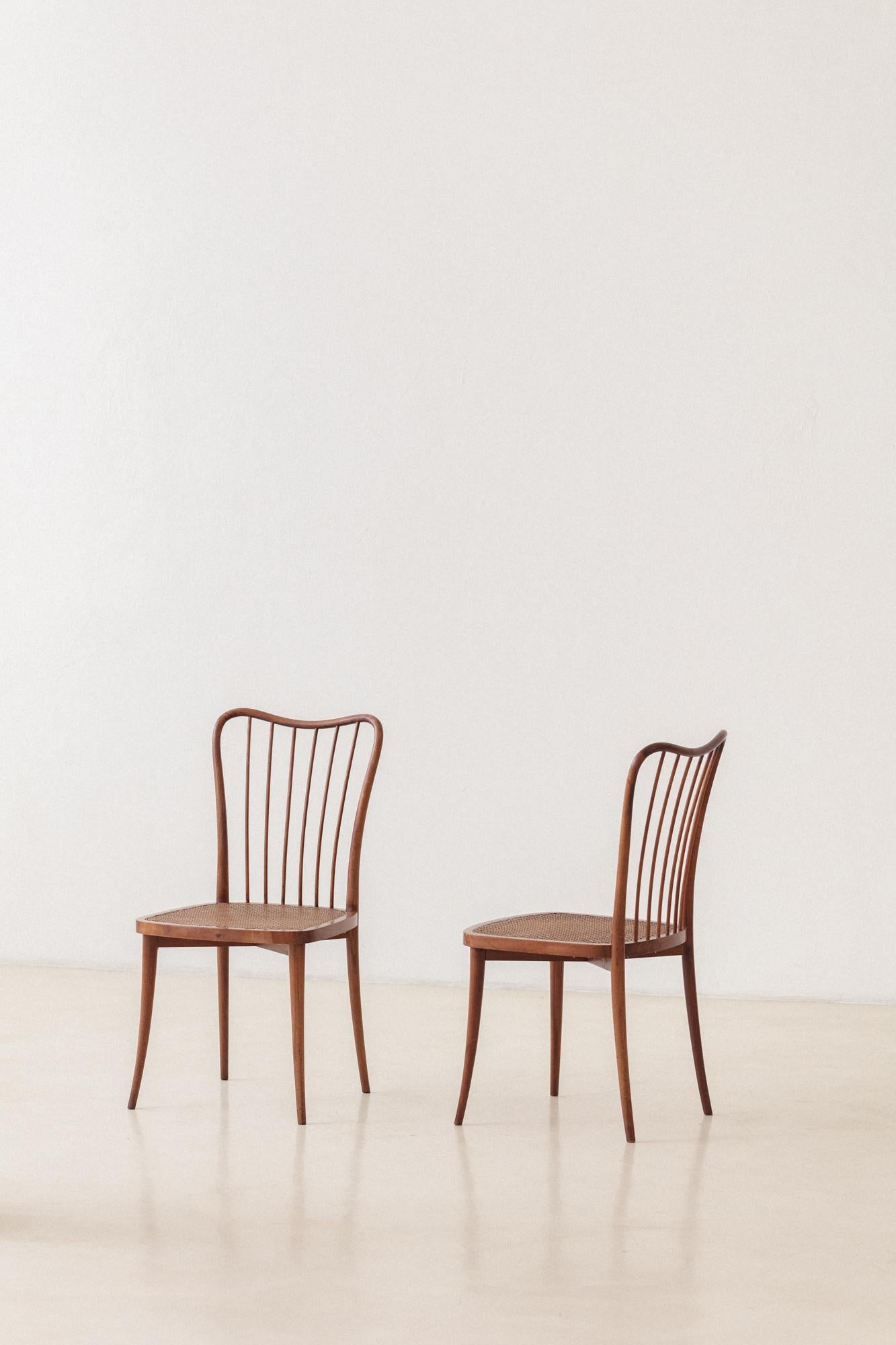 Brazilian Set of Eight Dining Chairs by Joaquim Tenreiro, Solid Wood and Cane, 1950s For Sale