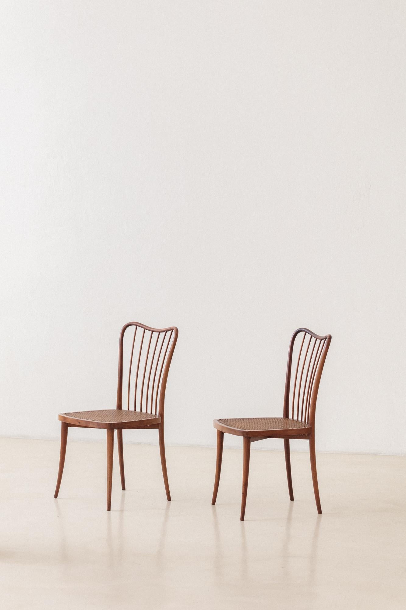 Hand-Crafted Set of Eight Dining Chairs by Joaquim Tenreiro, Solid Wood and Cane, 1950s For Sale