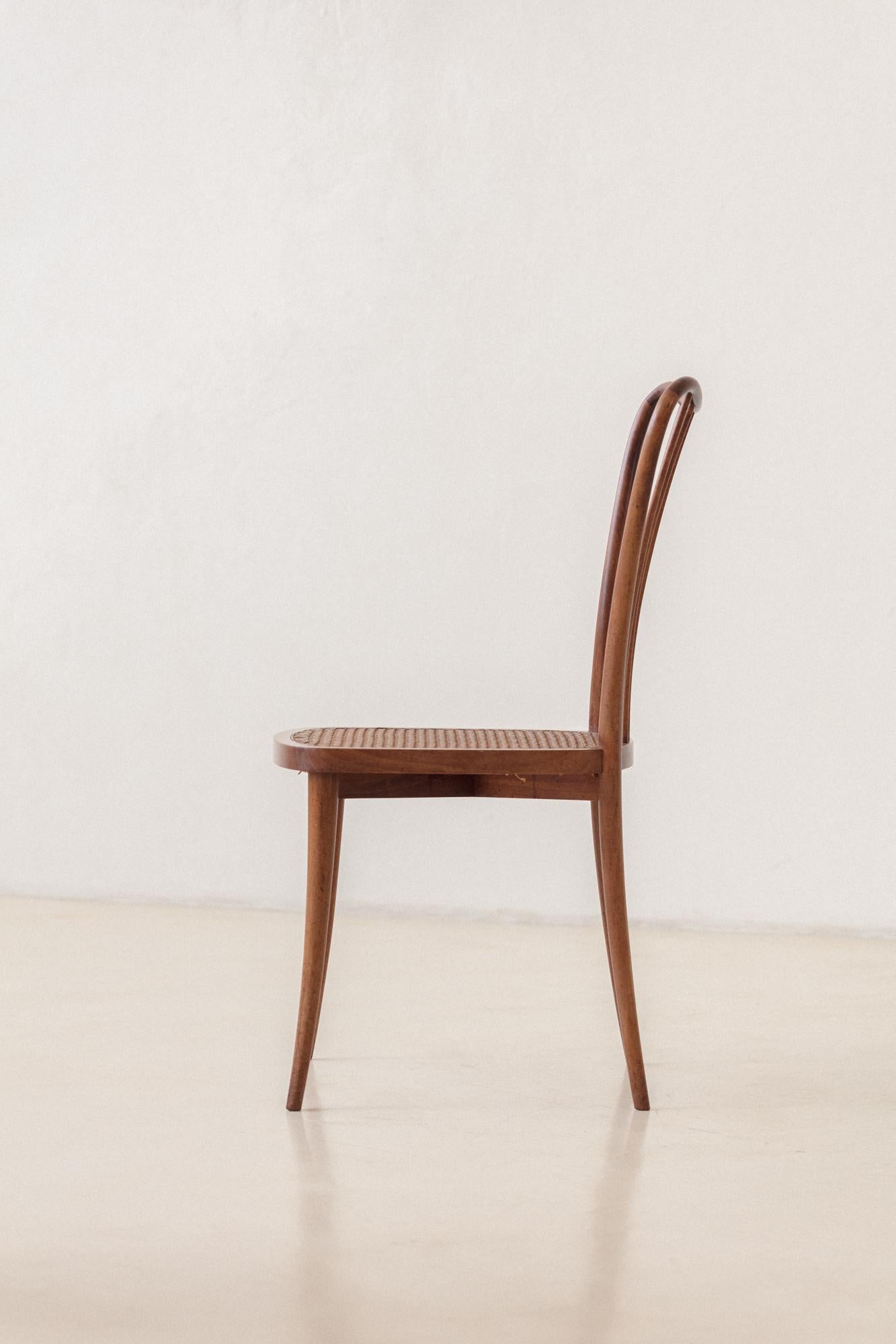 Mid-20th Century Set of Eight Dining Chairs by Joaquim Tenreiro, Solid Wood and Cane, 1950s For Sale
