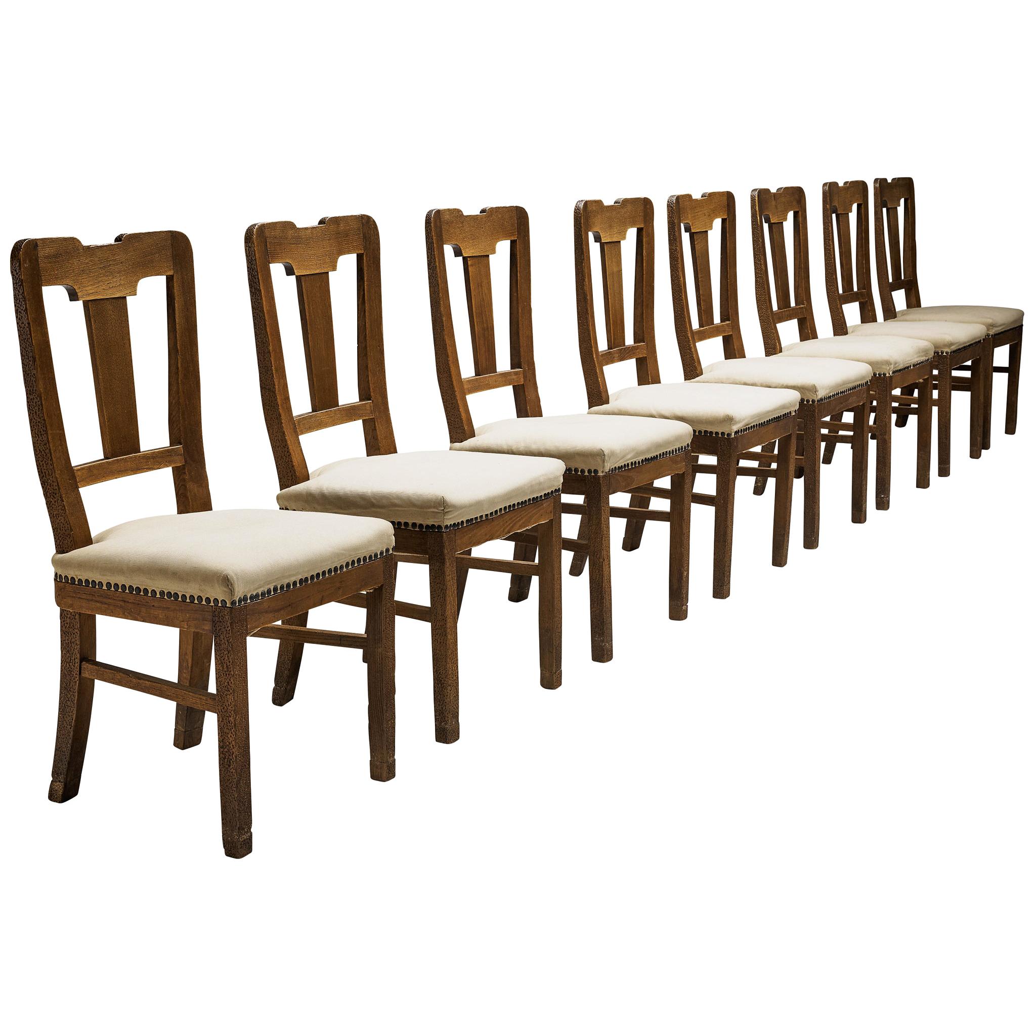 Set of Eight Dining Chairs in Oak by Ernesto Valabrega